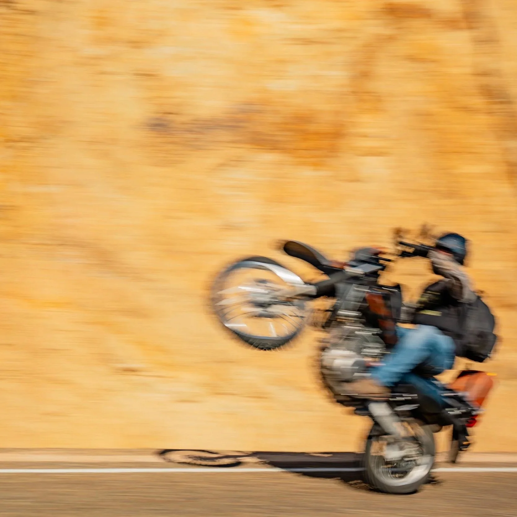 Suspended above the lush canopy, two women descend the Black Hole Drop Sinkhole, helmets and harnesses catching the light.