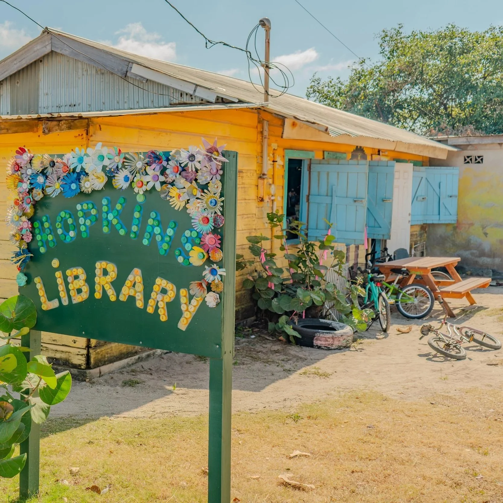 Two explorers wander through a cave completely engulfed by ancient, intricate rock formations.