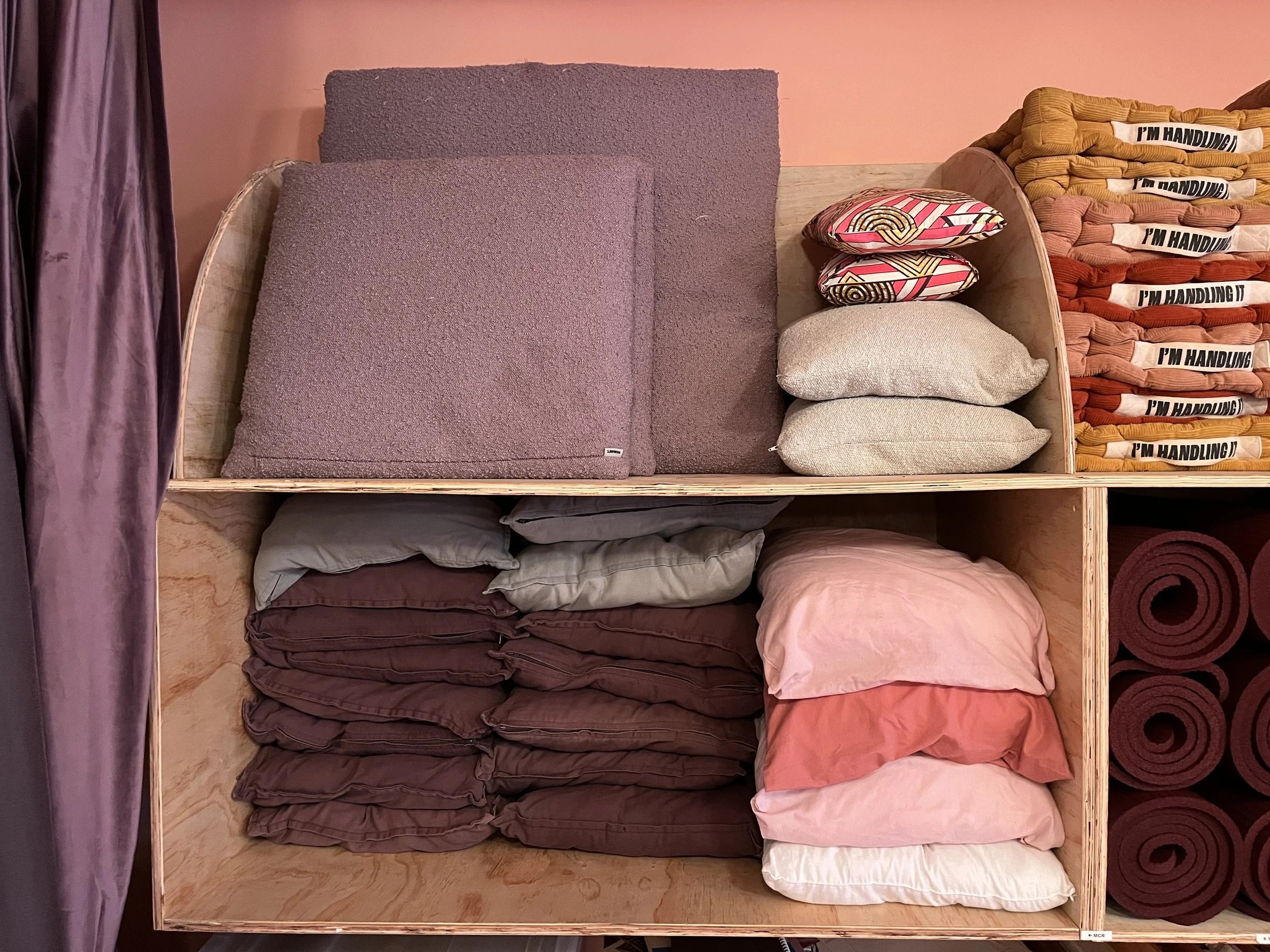 Step 2. Put all cushions, matts, rugs away in the correct storage location, making sure they are tidy and stored as per printed photos on shelving