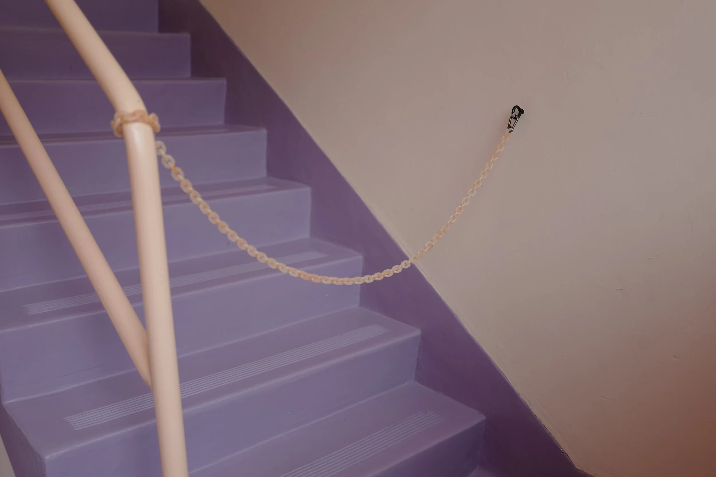 Step 27. Close chain at bottom of stairs