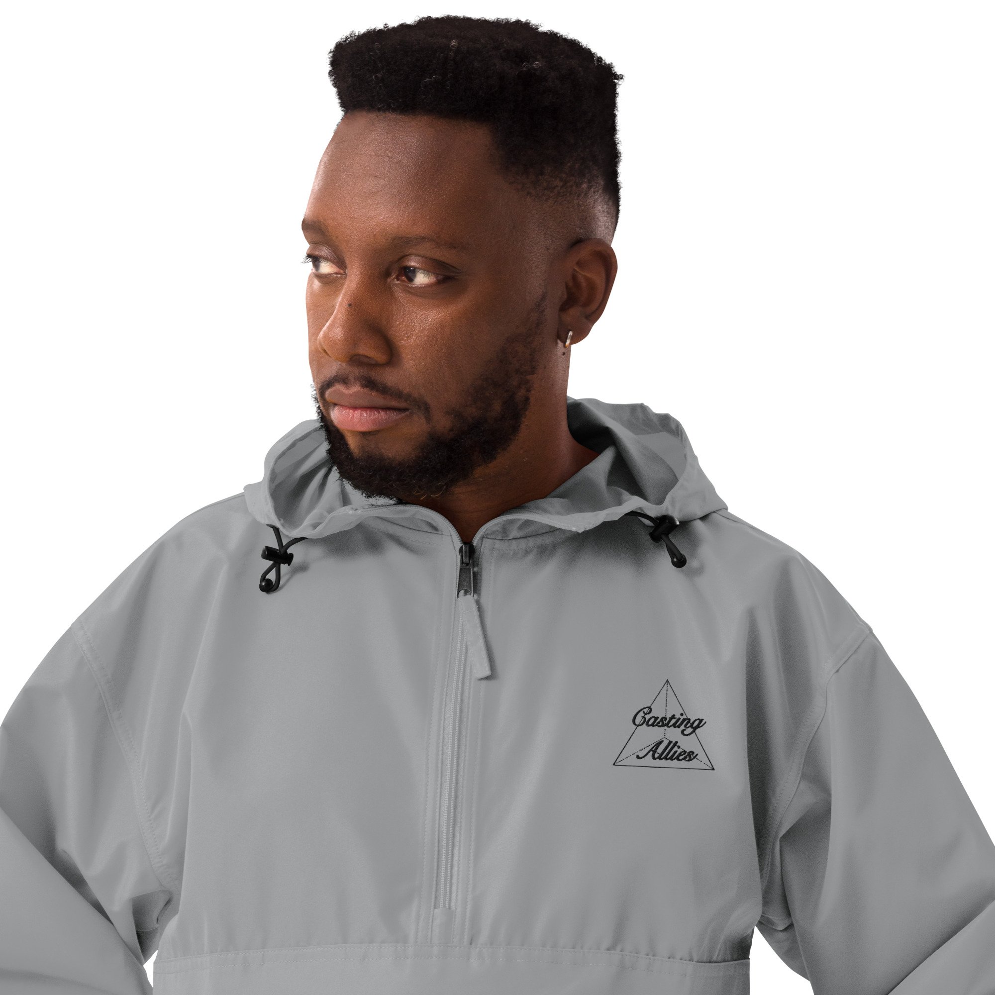 embroidered-champion-packable-jacket-graphite-zoomed-in-6520bdb23e05c.jpg
