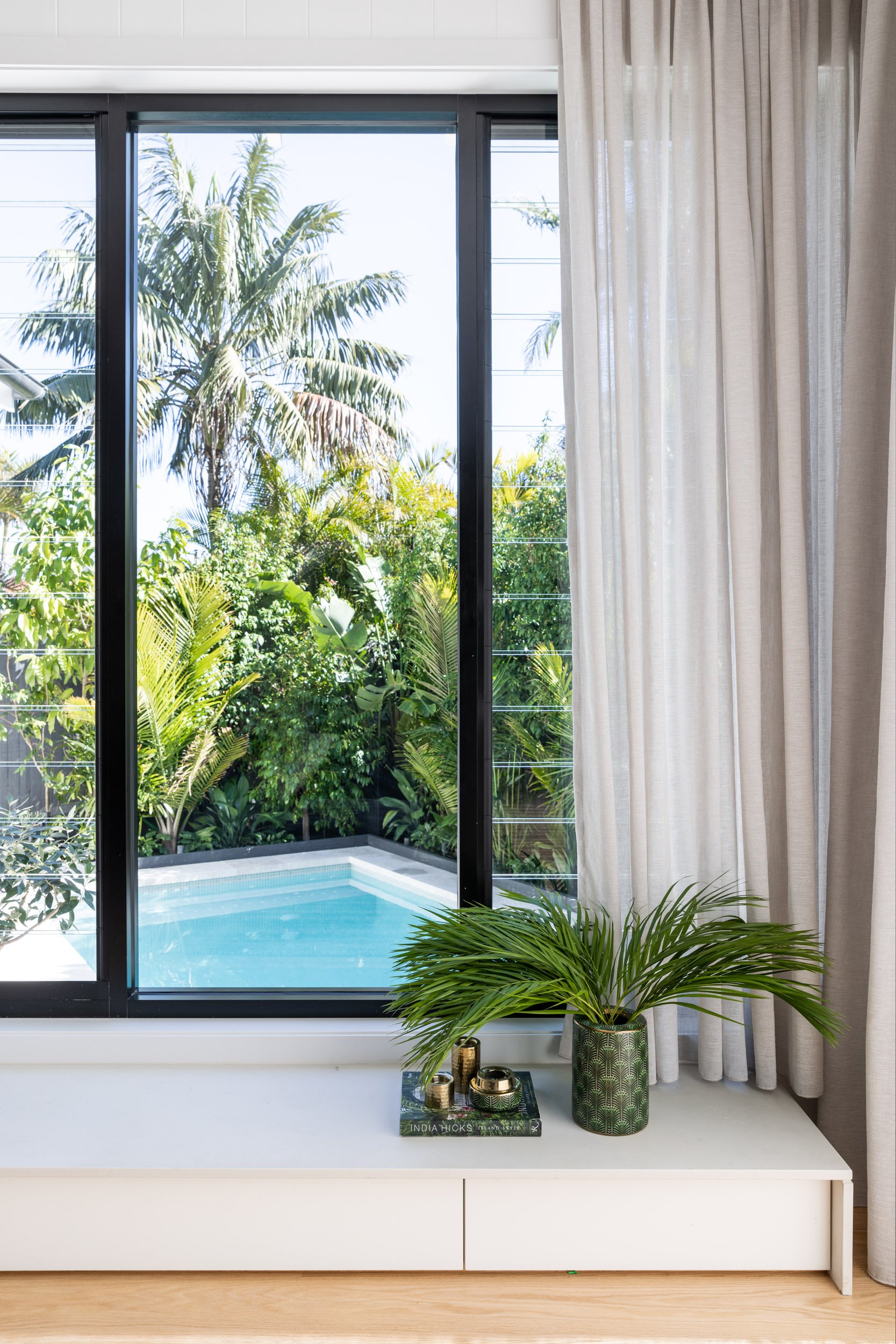 ACTION-plans_iluka-palms-hamptons-luxury-home_Manly-black-framed-windows-pool-view-simon-whitbread_018.jpg