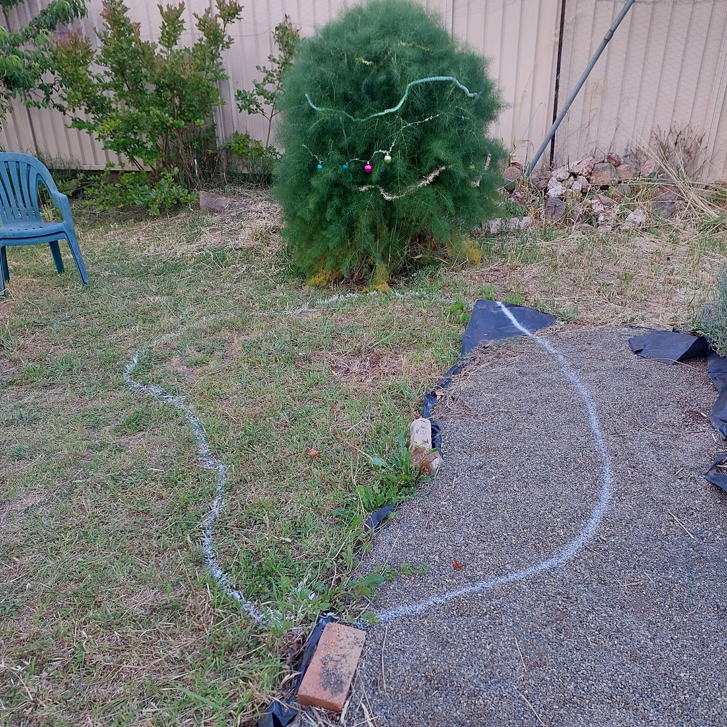 Marking out the raingarden site.jpg