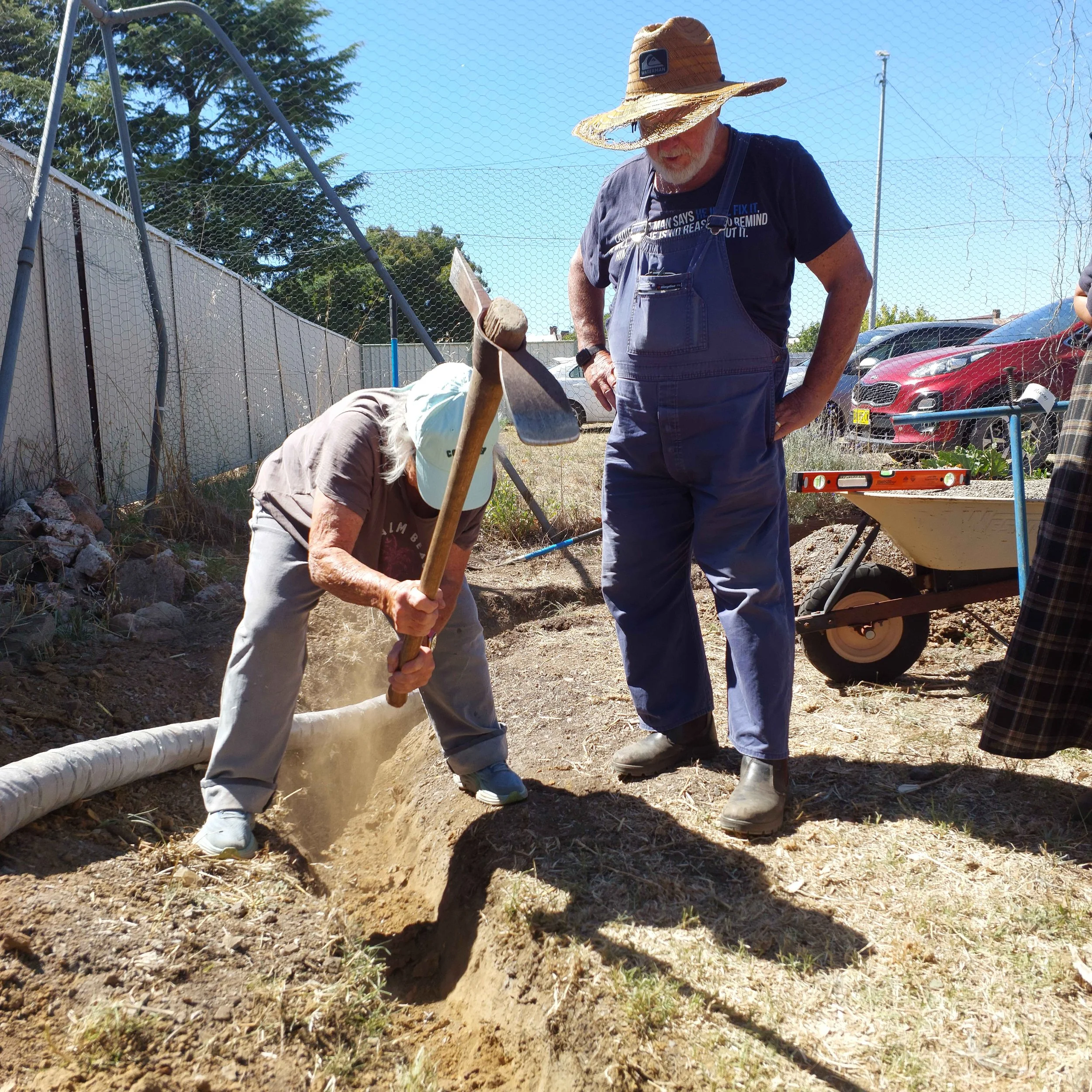 Digging the raingarden trench.jpg