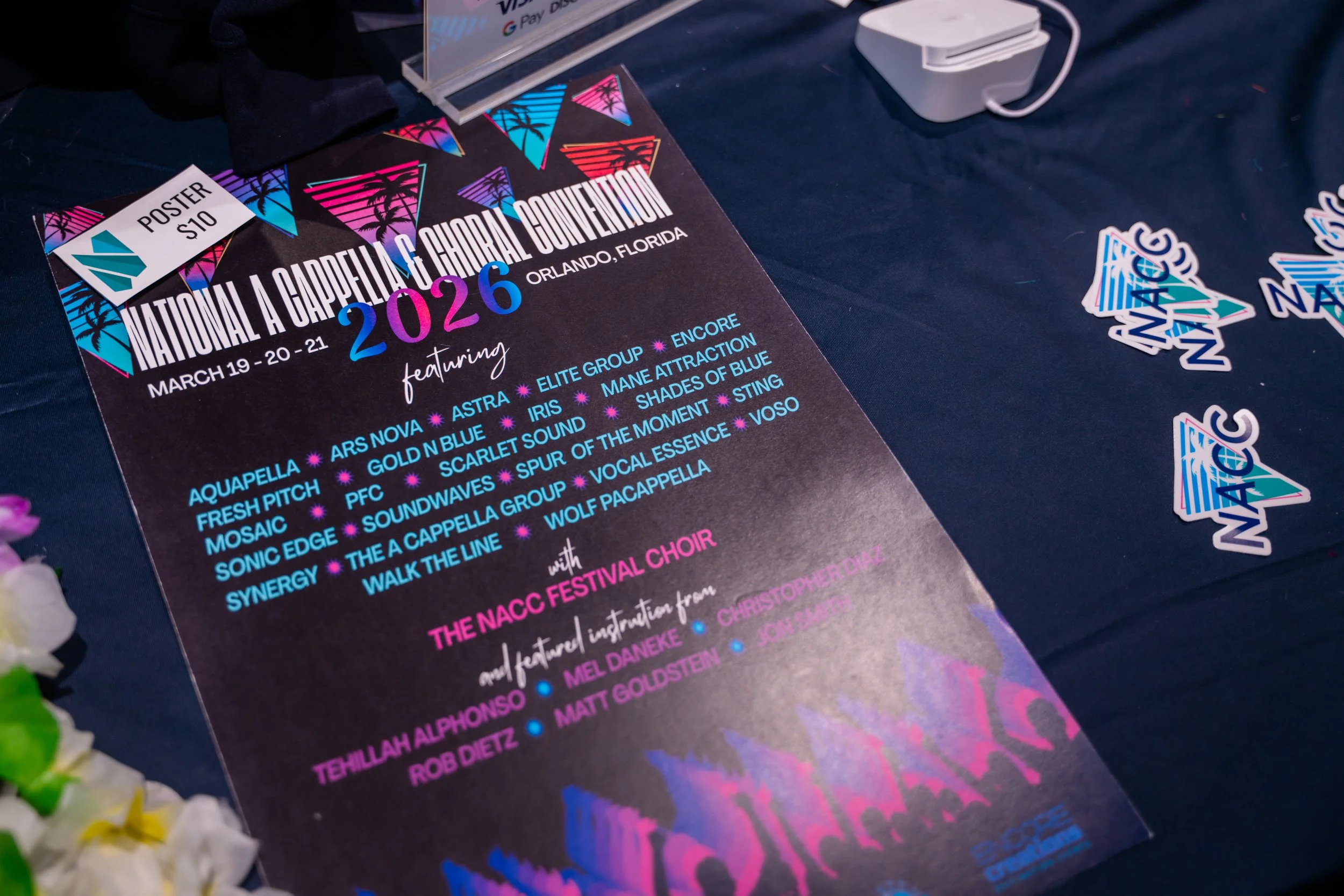 A colorful poster advertising the 2026 National A Cappella Conference in Orlando, Florida, featuring a list of performers and event details.