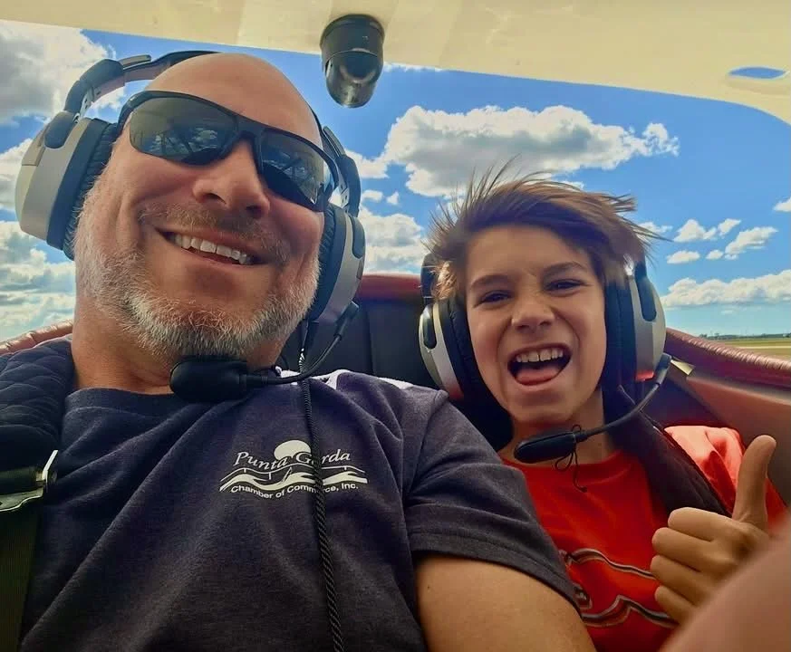 father-son-birthday-flight-aboard-gracie-biplane.jpeg