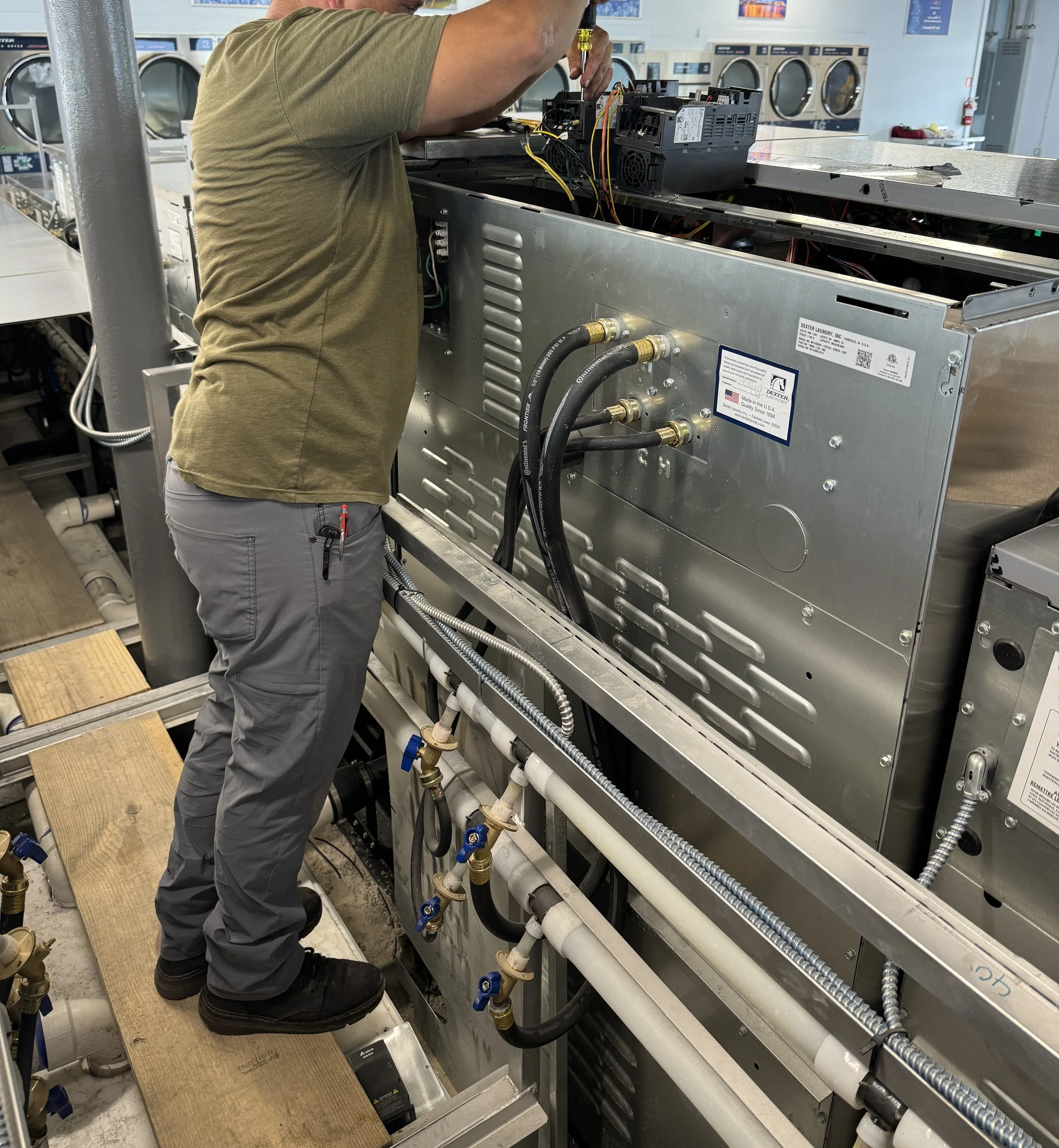 Need to work on your washer?  No Problem, just open the door, set your your lids on the washers and stand upright at the back of your washer and take care of business - Super Easy! 