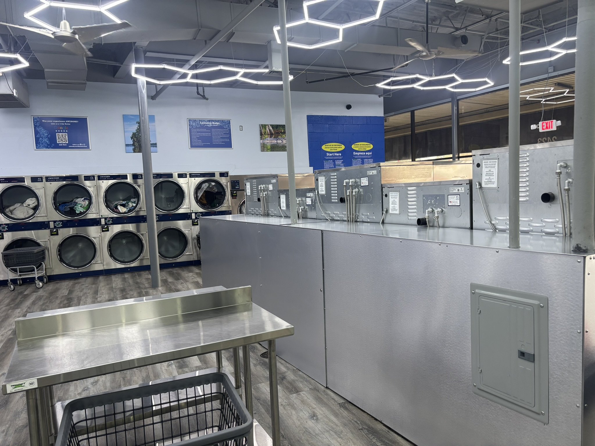The hoses disappear, removing one more concern about having your bulkheads shorter, thus your customer's sightlines improved!  Thus bulkhead has a custom Center Door, and the Electrical Panel on the back.  #ForLaundromatOwner #ByLaundromatOwners