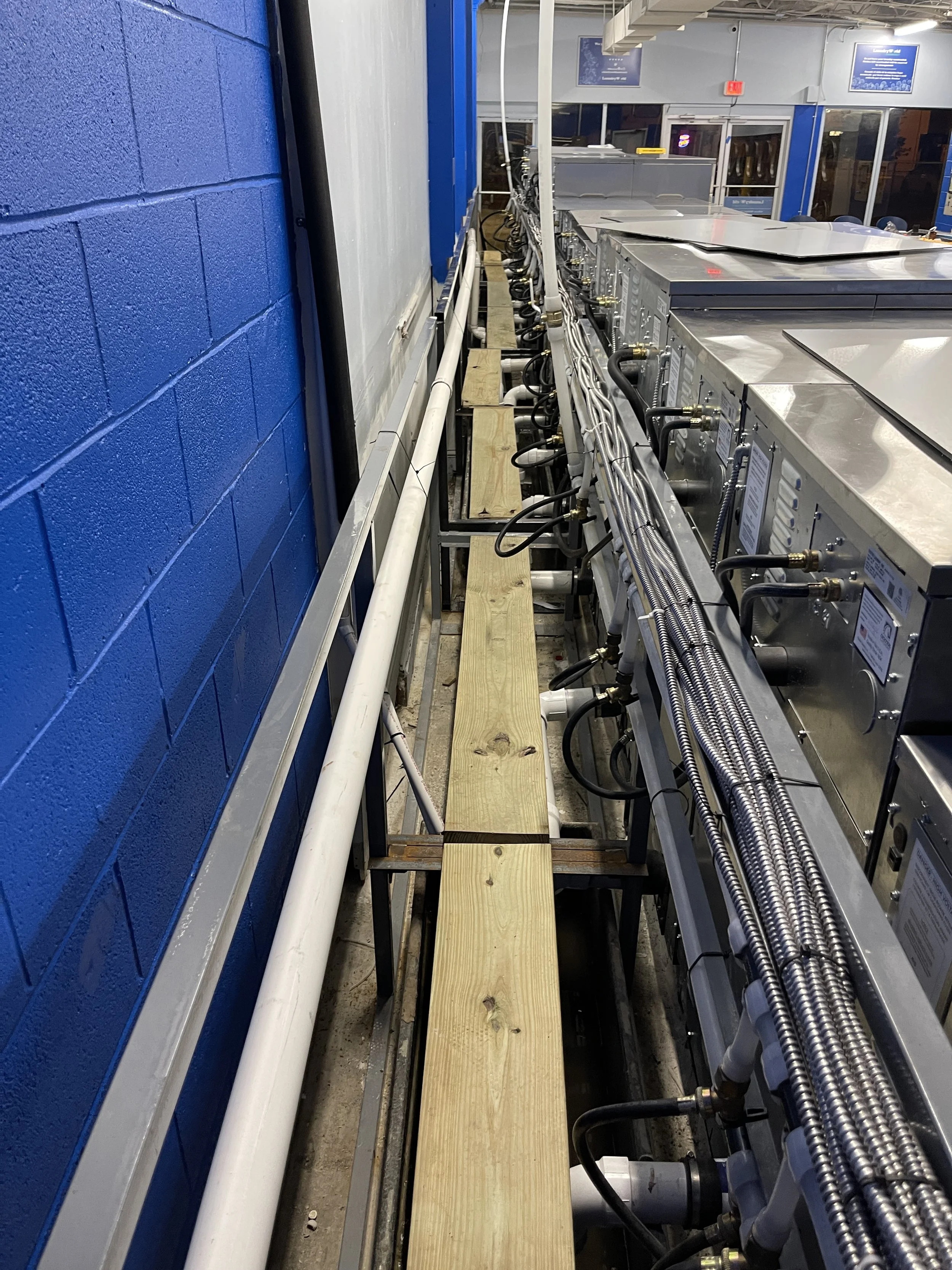 One of our very first units - Just WALK behind the washers and take care of your install, cleaning or maintenance!