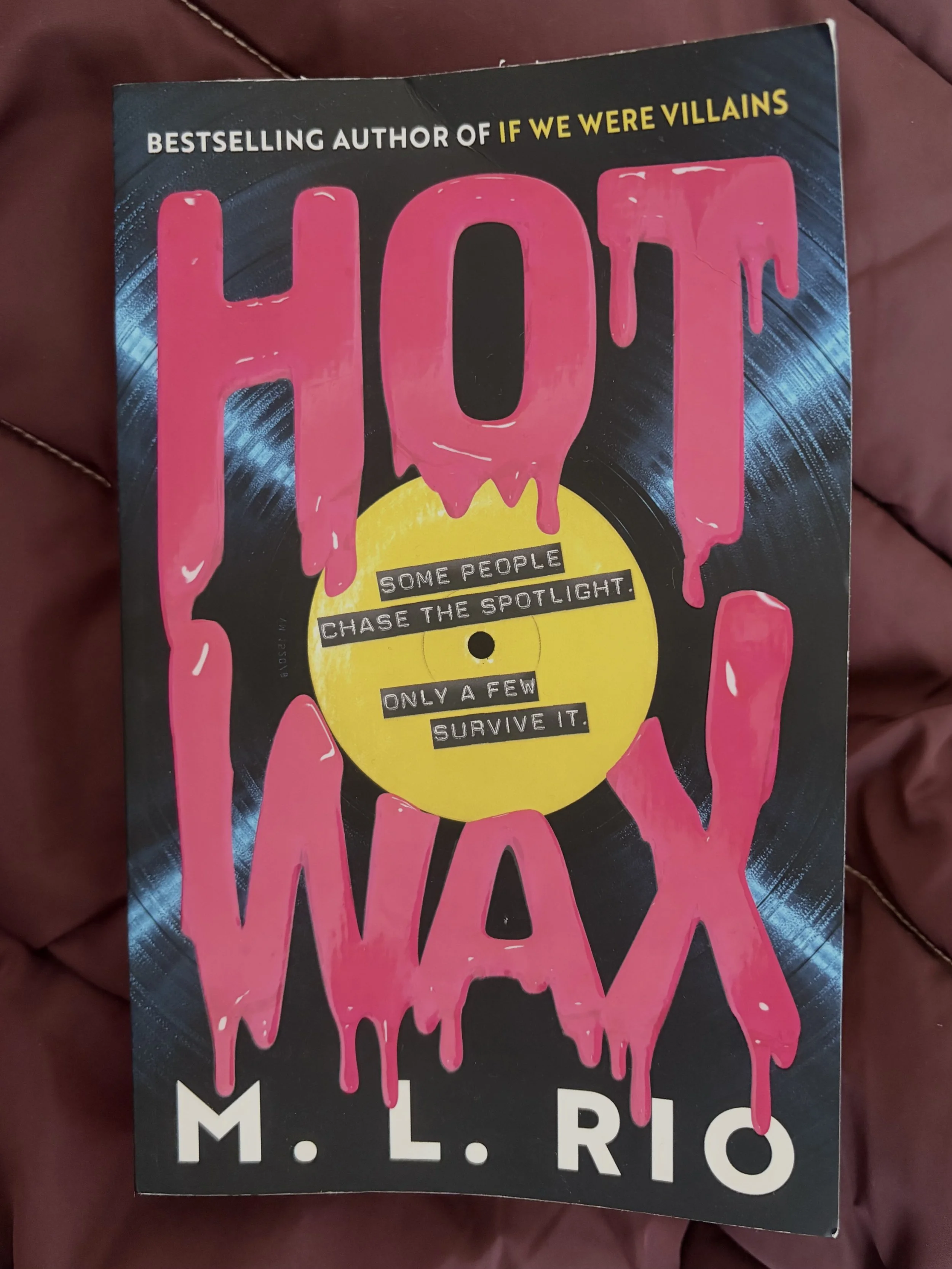 Hot Wax on top of purple winter coat