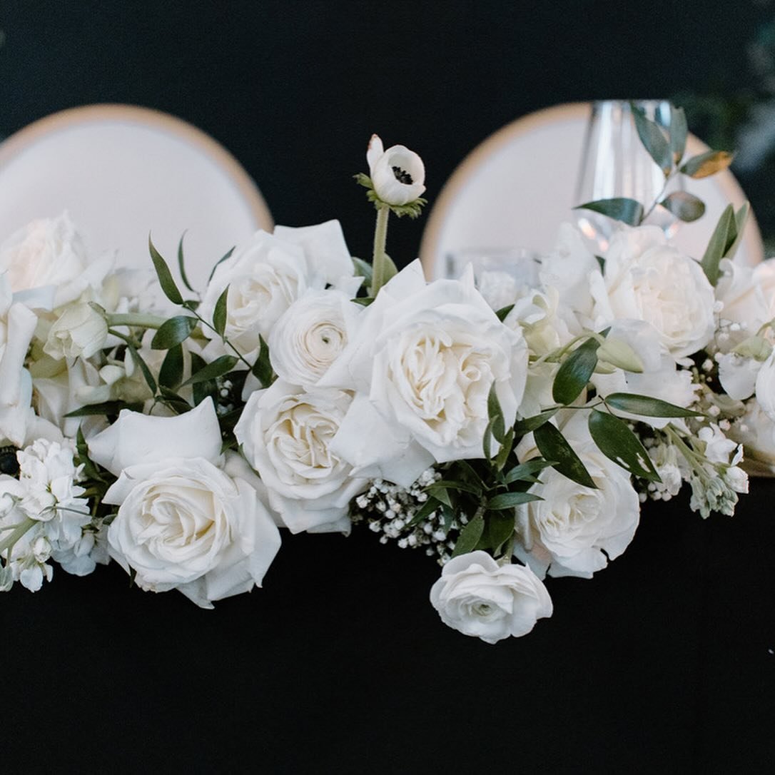 Fluffy white Playa Blanca roses alongside tulips, ranuncs and anemones. Quality over quantity made for a rich and elegant vibe for Danielle and her maids on what felt like the coldest day of the year in February at Tapestry Hall.

Sometimes keeping t