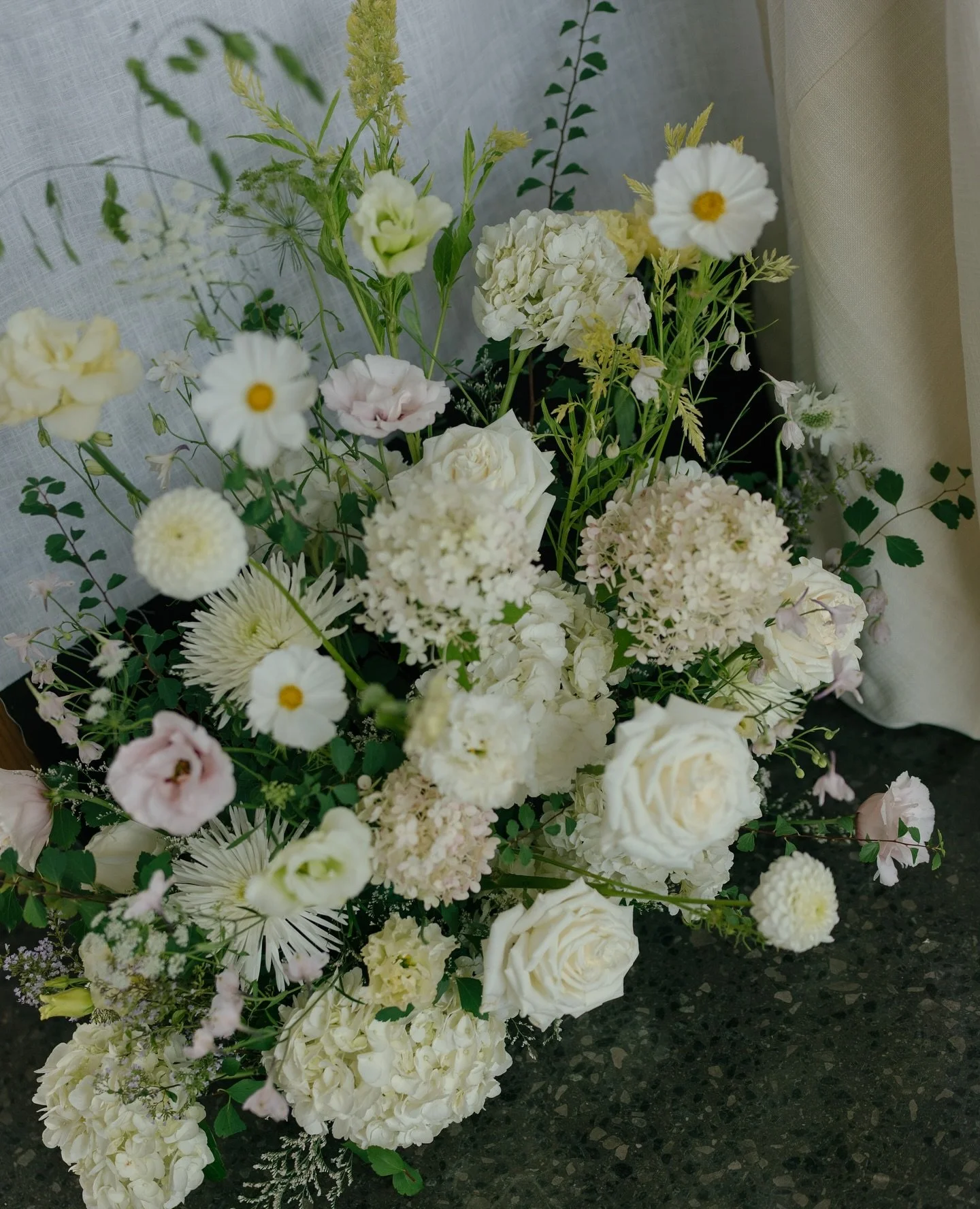 A romantic September wedding in Niagara-on-the-Lake. 

Beginning with an elegant outdoor ceremony at Queen&rsquo;s Landing and ending with a candlelit reception in the Press Alley at Stratus Vineyards, surrounded by over 300. 

Two distinct designs, 