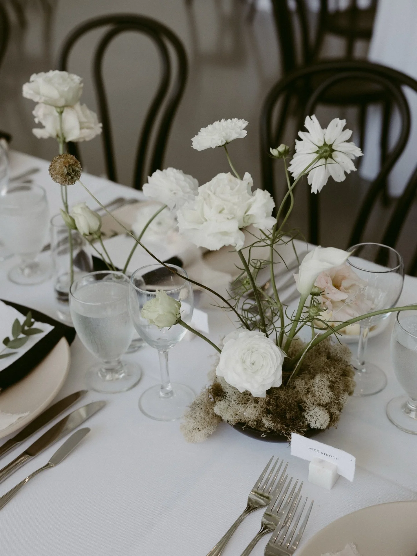 There&rsquo;s something about designing inside a gallery that changes the way I approach flowers.

At the Art Gallery of Hamilton, the architecture already speaks. Clean lines, soft light, open space. The florals don&rsquo;t need to compete. They nee