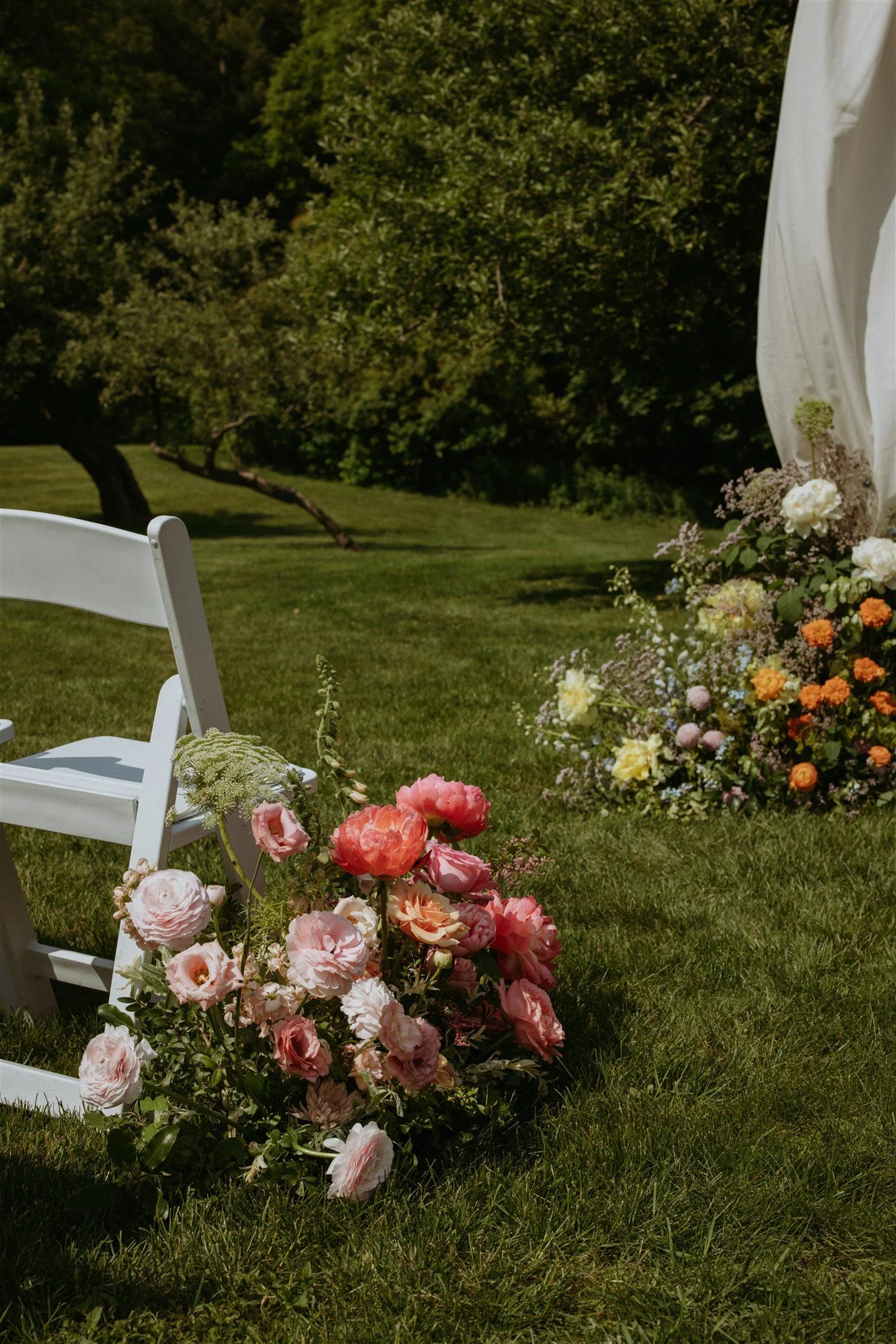Floral meadow with pink peonies and roses