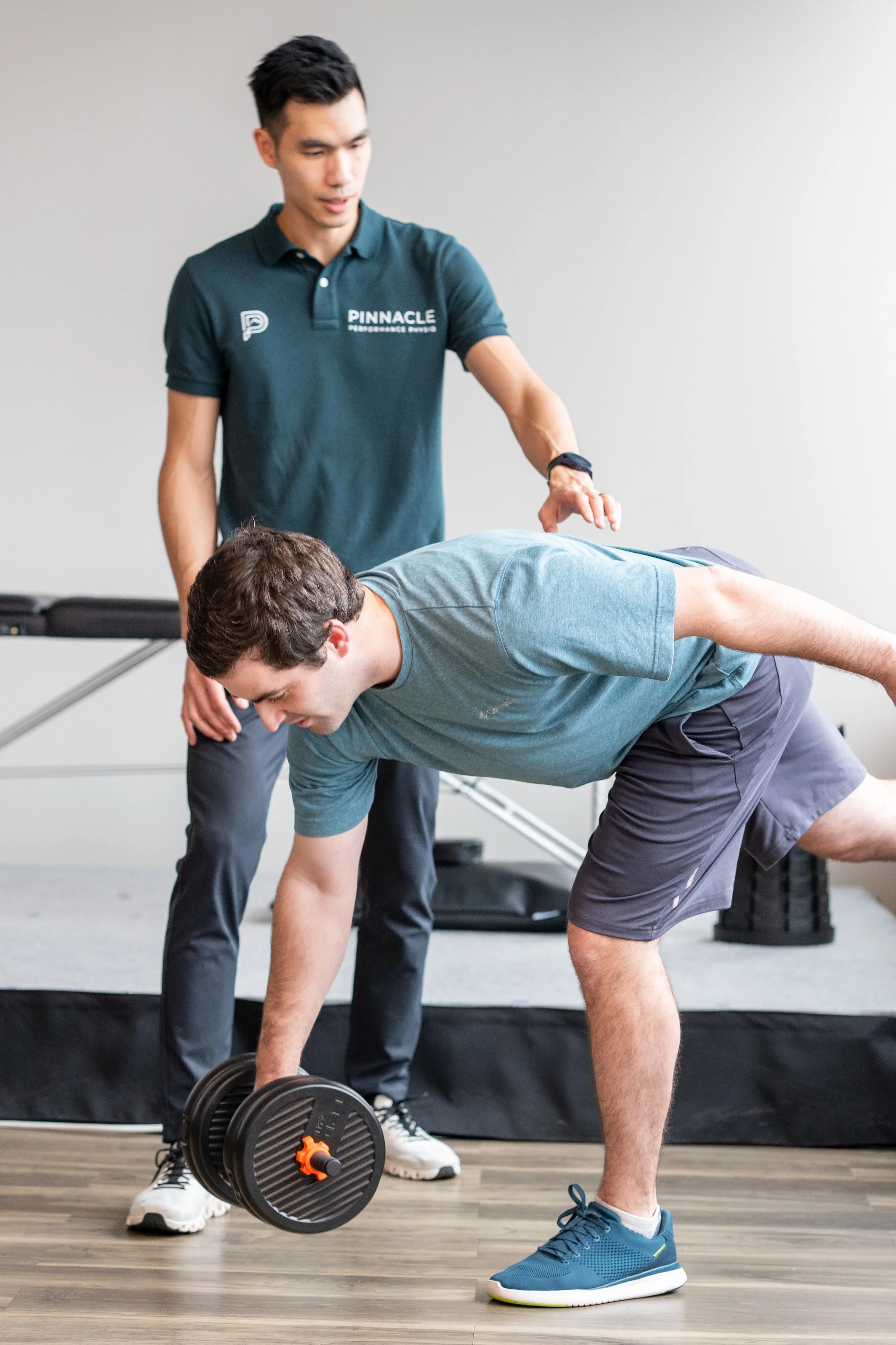 Patient receiving manual therapy treatment at a physical therapy clinic in Bellevue, WA