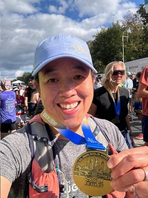 Kelly smiling with her Berlin Marathon medal