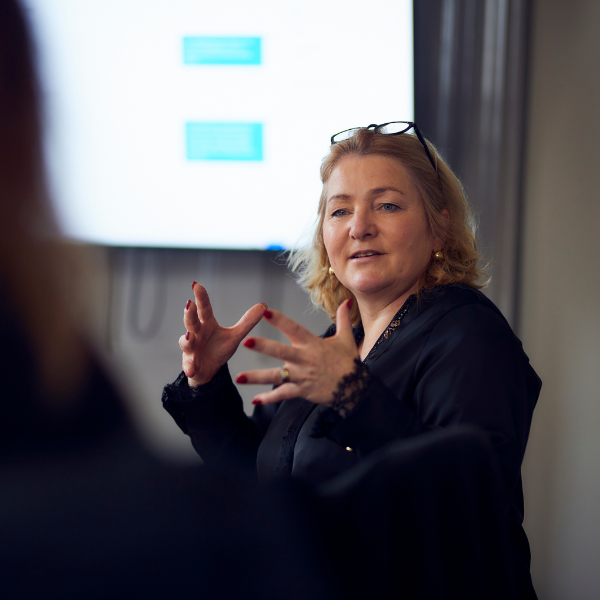 How can businesses strike a balance between relying on AI and maintaining human judgement?