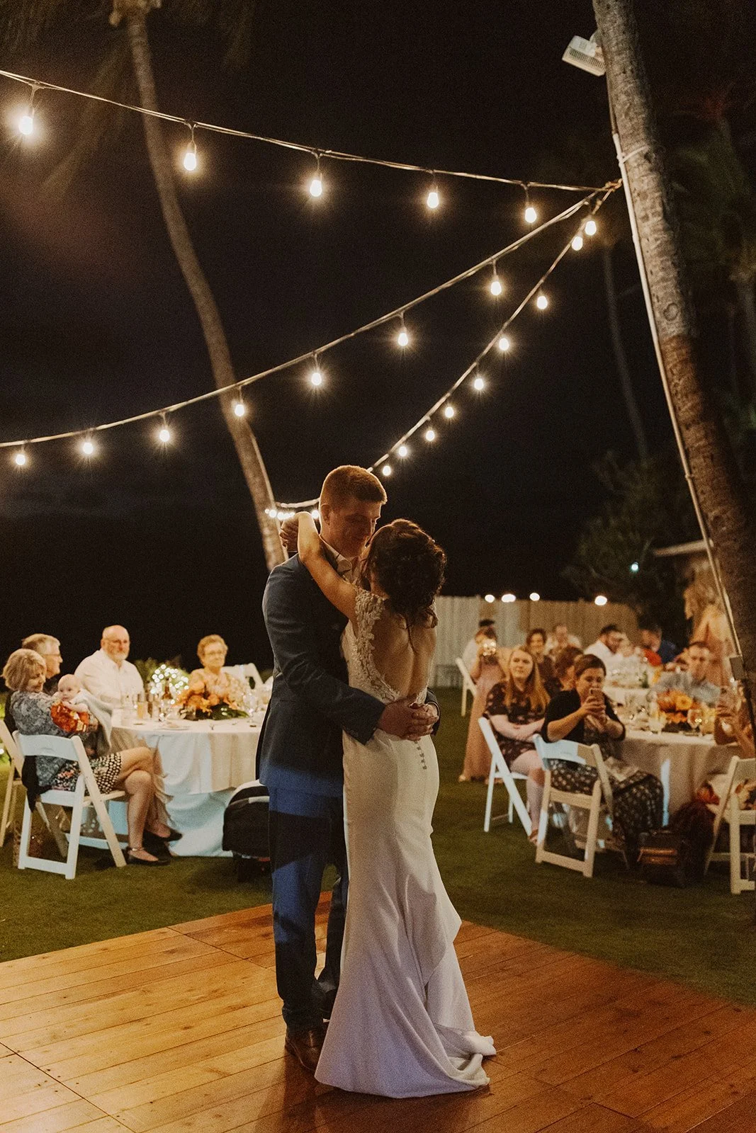First Dance under Twinkle Lights by the Ocean