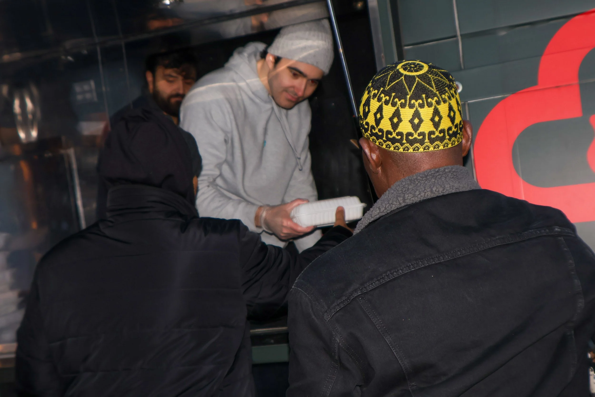 Photo showing food distribution and community care efforts.