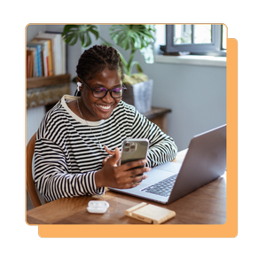 a lady working at her desk at home 