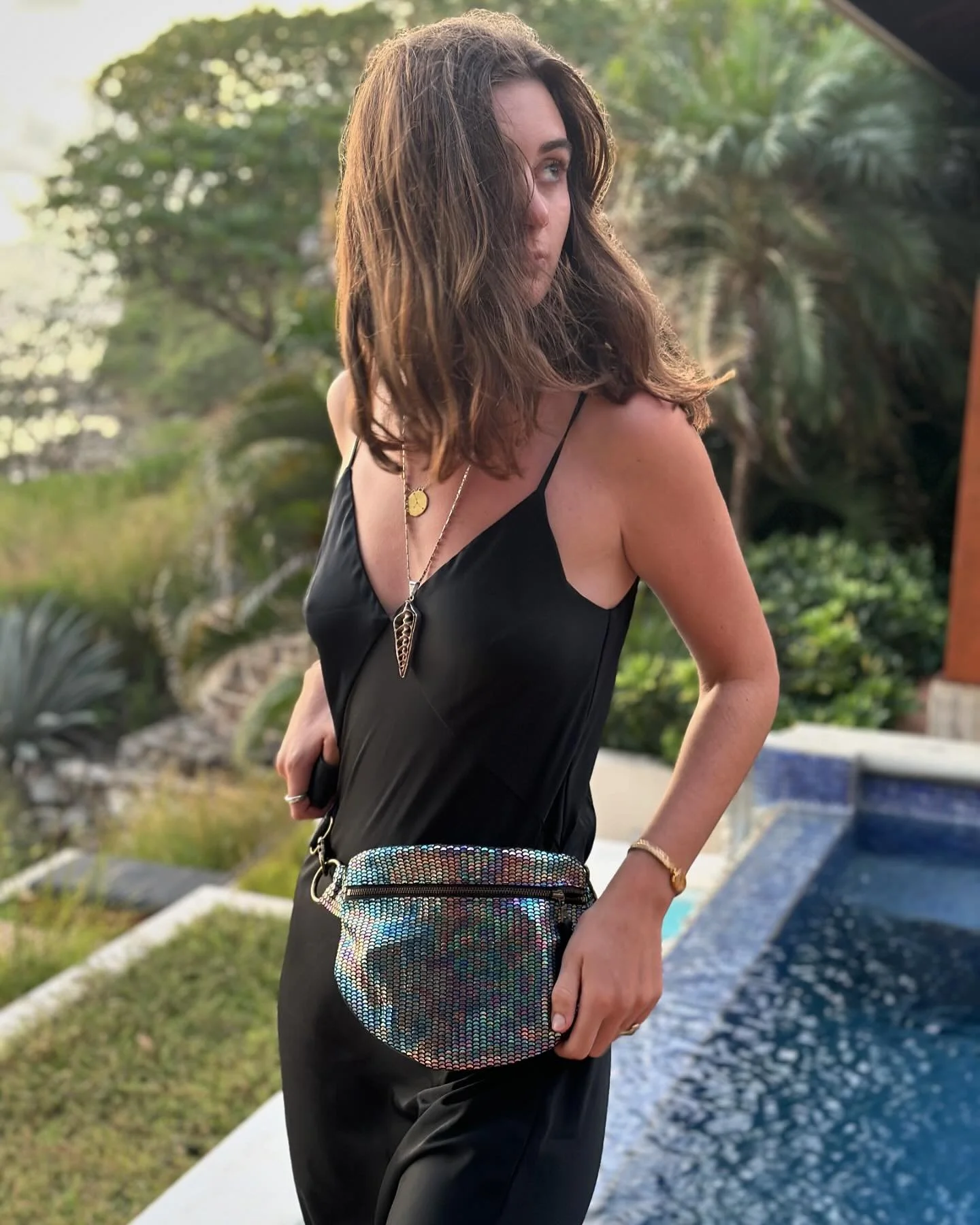 &ldquo;I must be a mermaid. I have no fear of depths and a great fear of shallow living.&rdquo; - Ana&iuml;s Nin 

RIDER SLING &bull; iridescent mermaid leather 🧜🏽&zwj;♀️