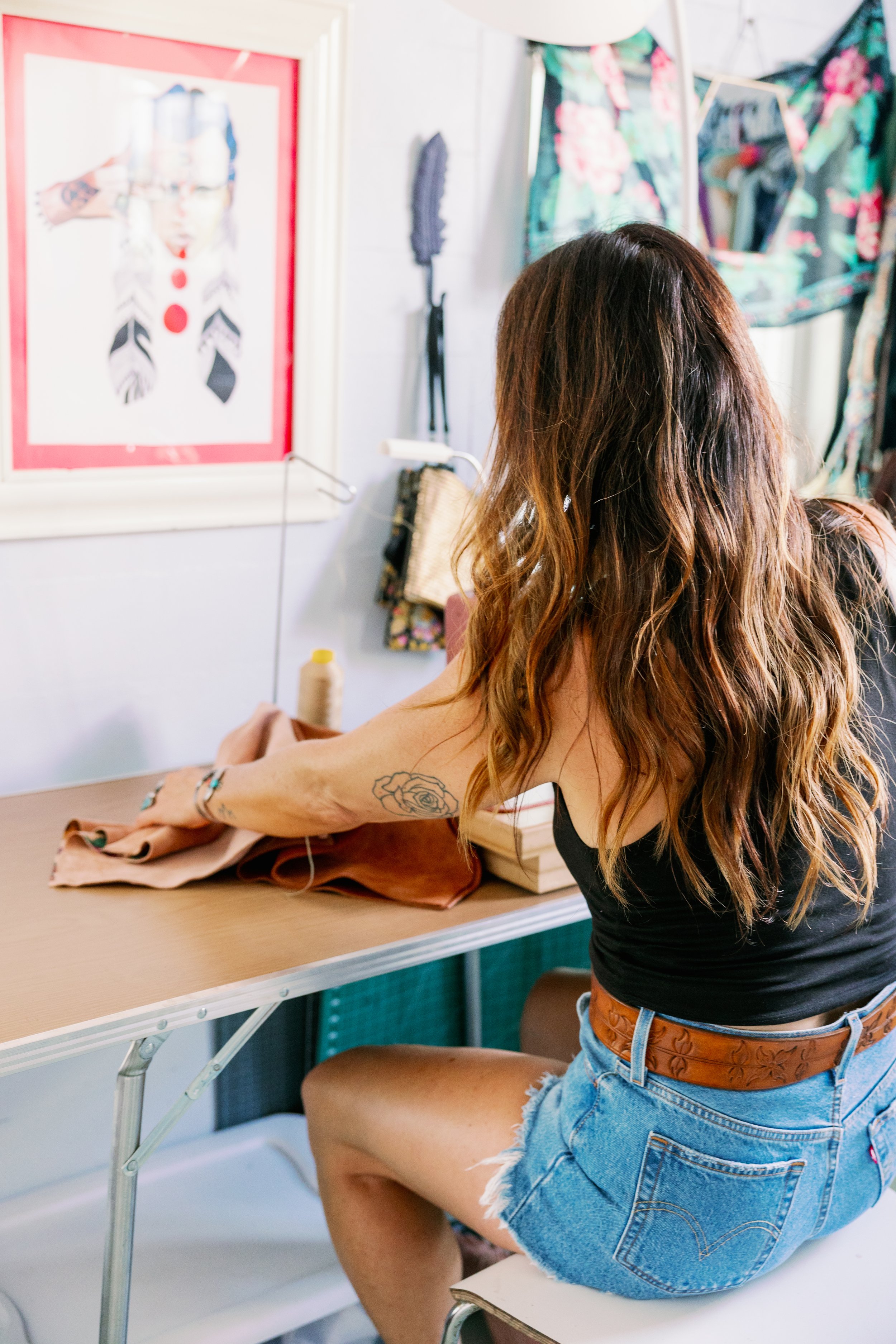 Carrie Hall owner and founder of lovestruck leather. Specialized in custom leather bags handmade in Key West