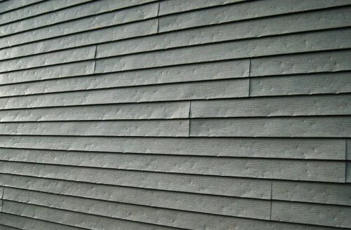 hail damage on alum siding.jpeg
