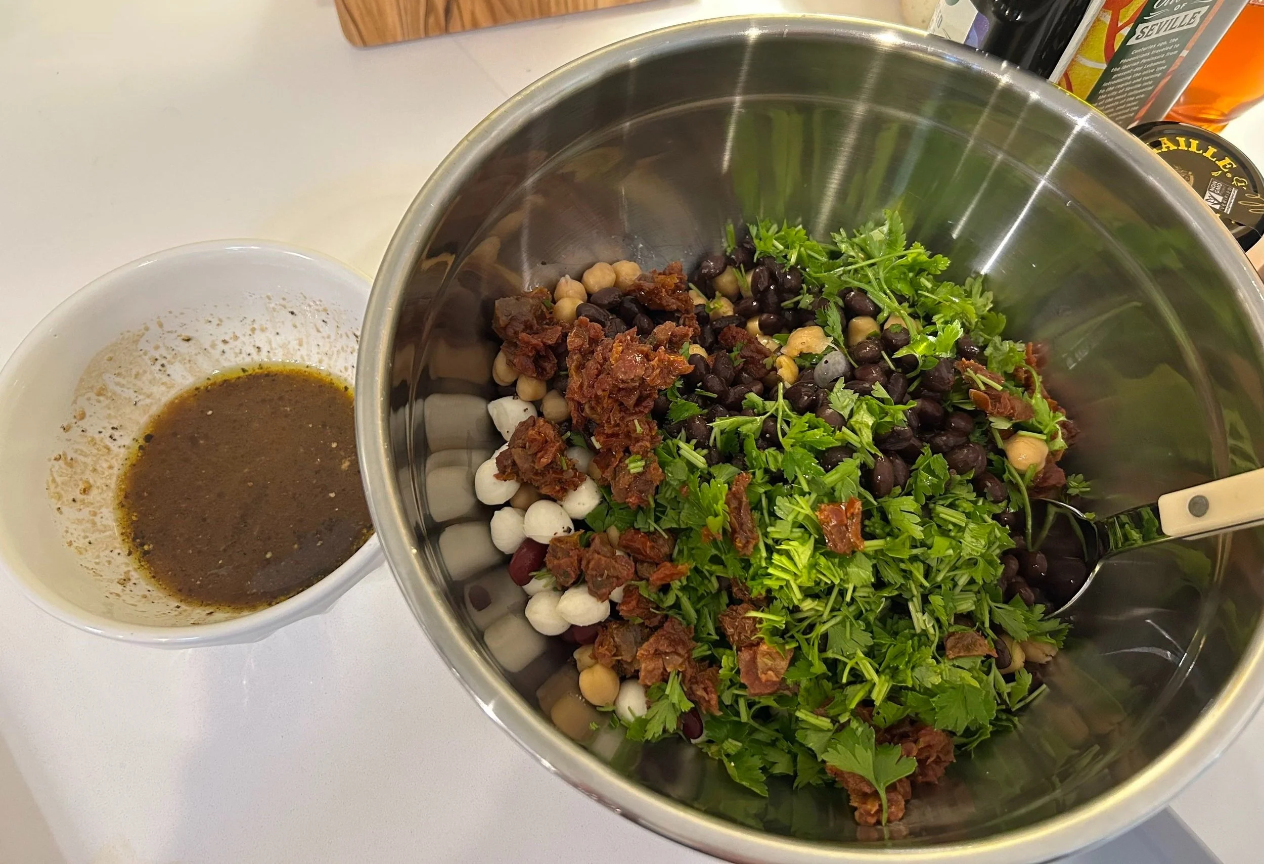 herby 3 bean salad in the process of being made