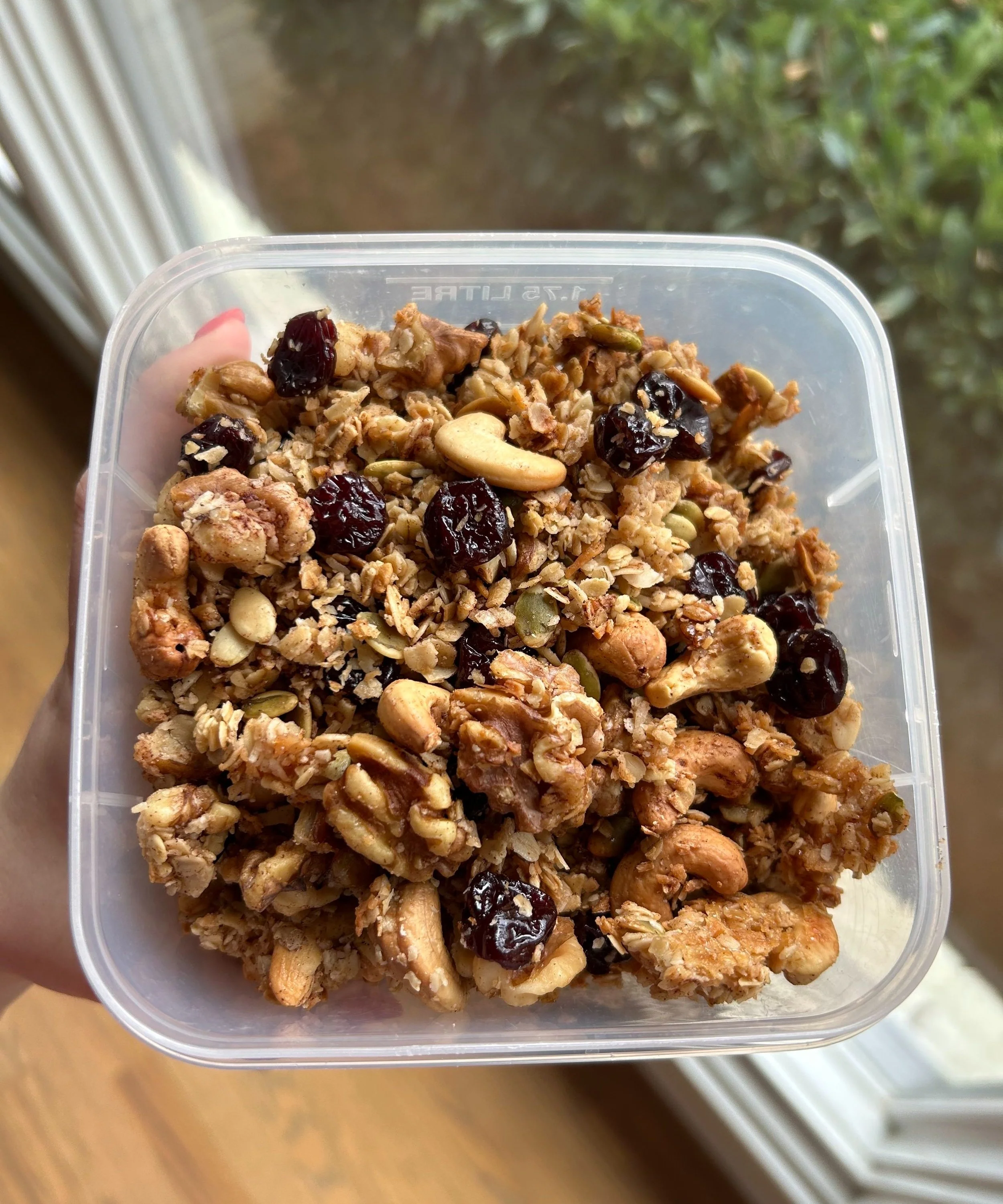 freshly baked homemade cherry cinnamon granola, ready to eat