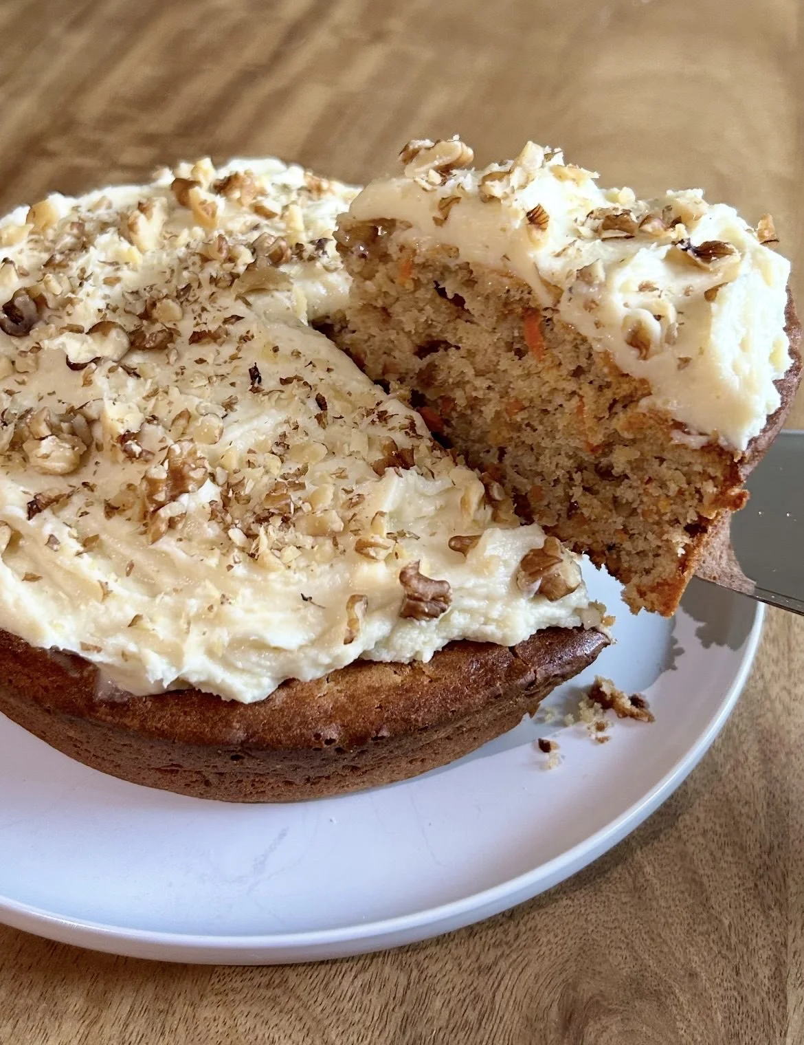 Deliciously sweet and rich olive oil carrot cake ready to enjoy as a dessert