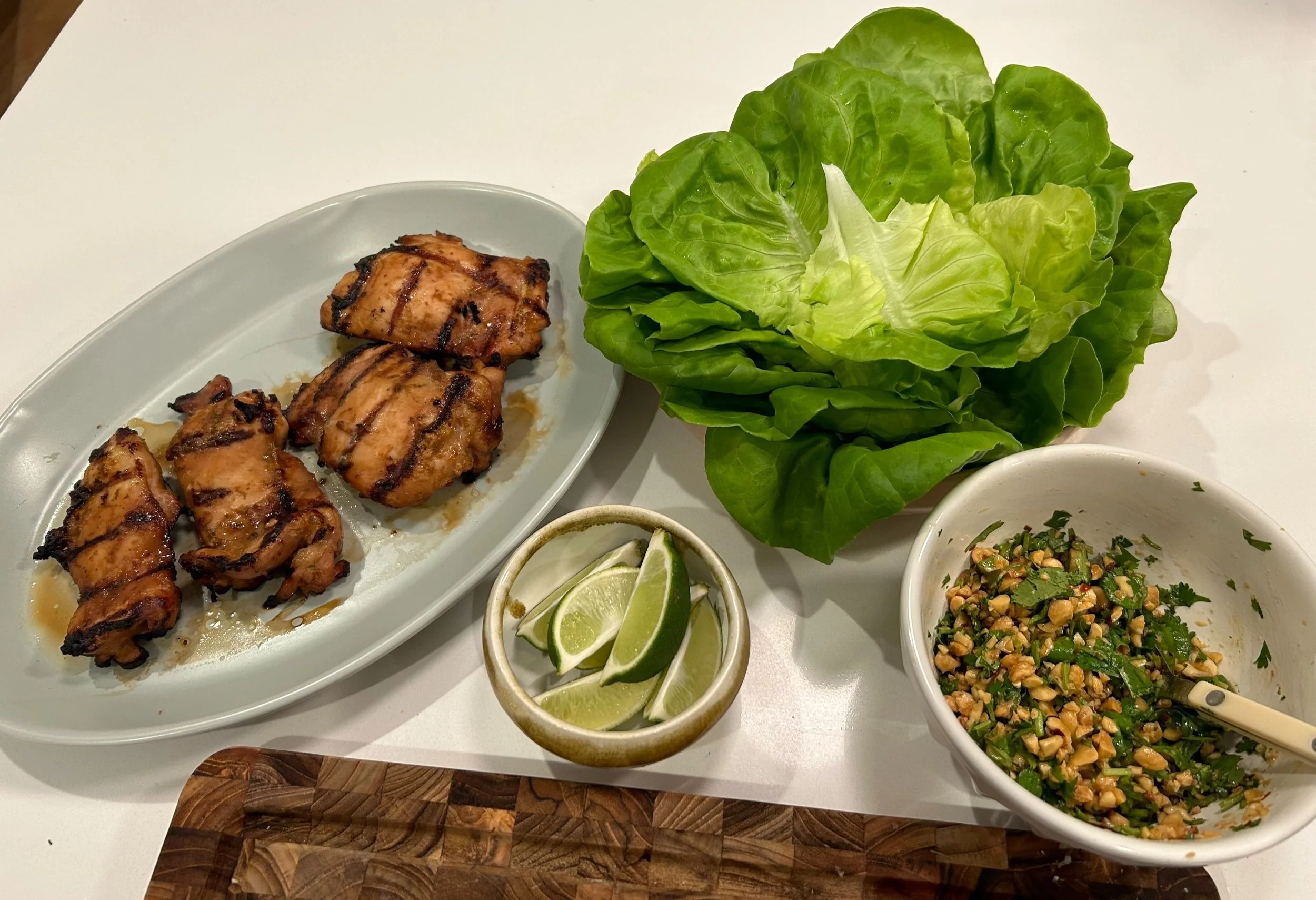 all of the components of Thai chicken lettuce wraps ready to be served