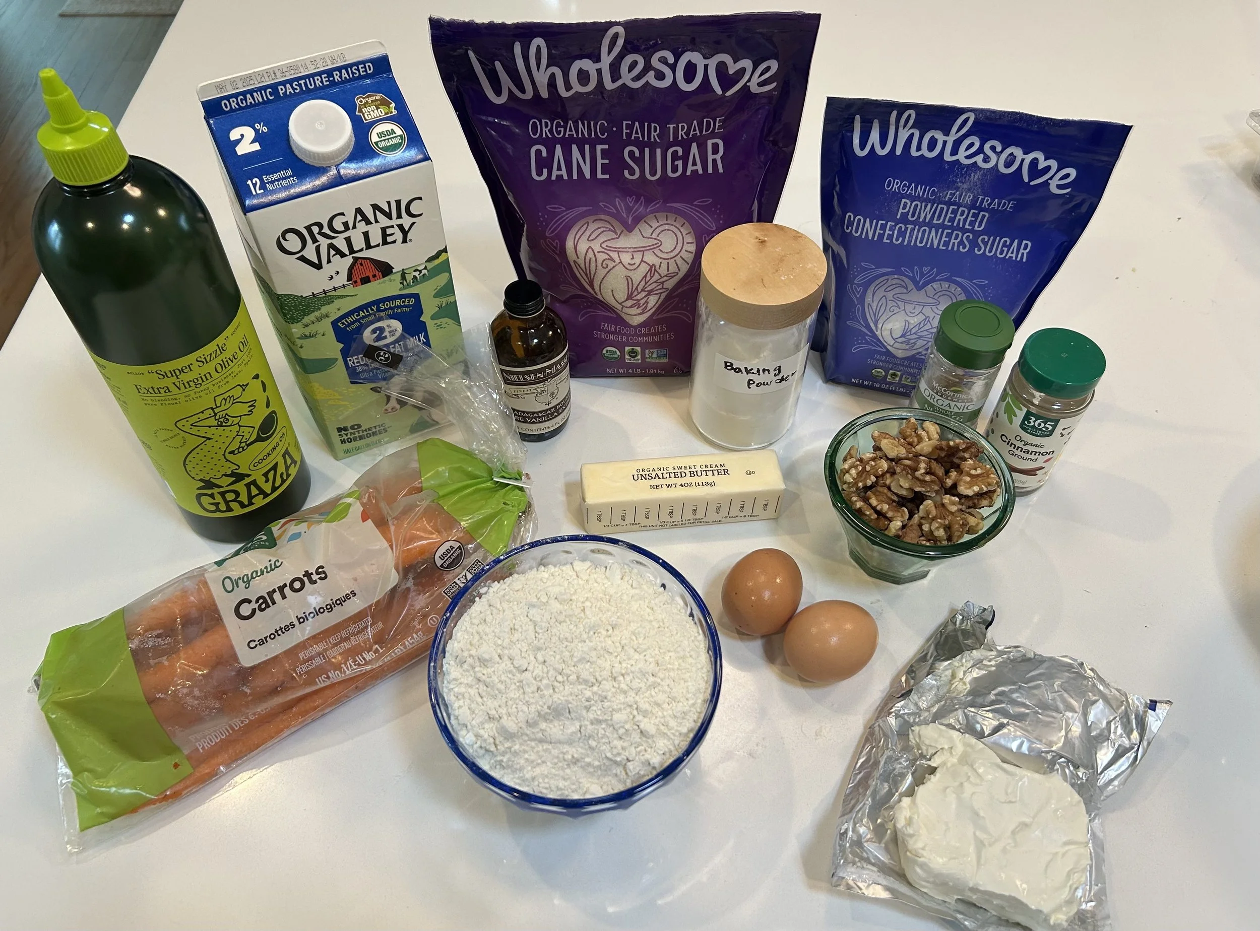 all of the ingredients you need to create this olive oil carrot cake