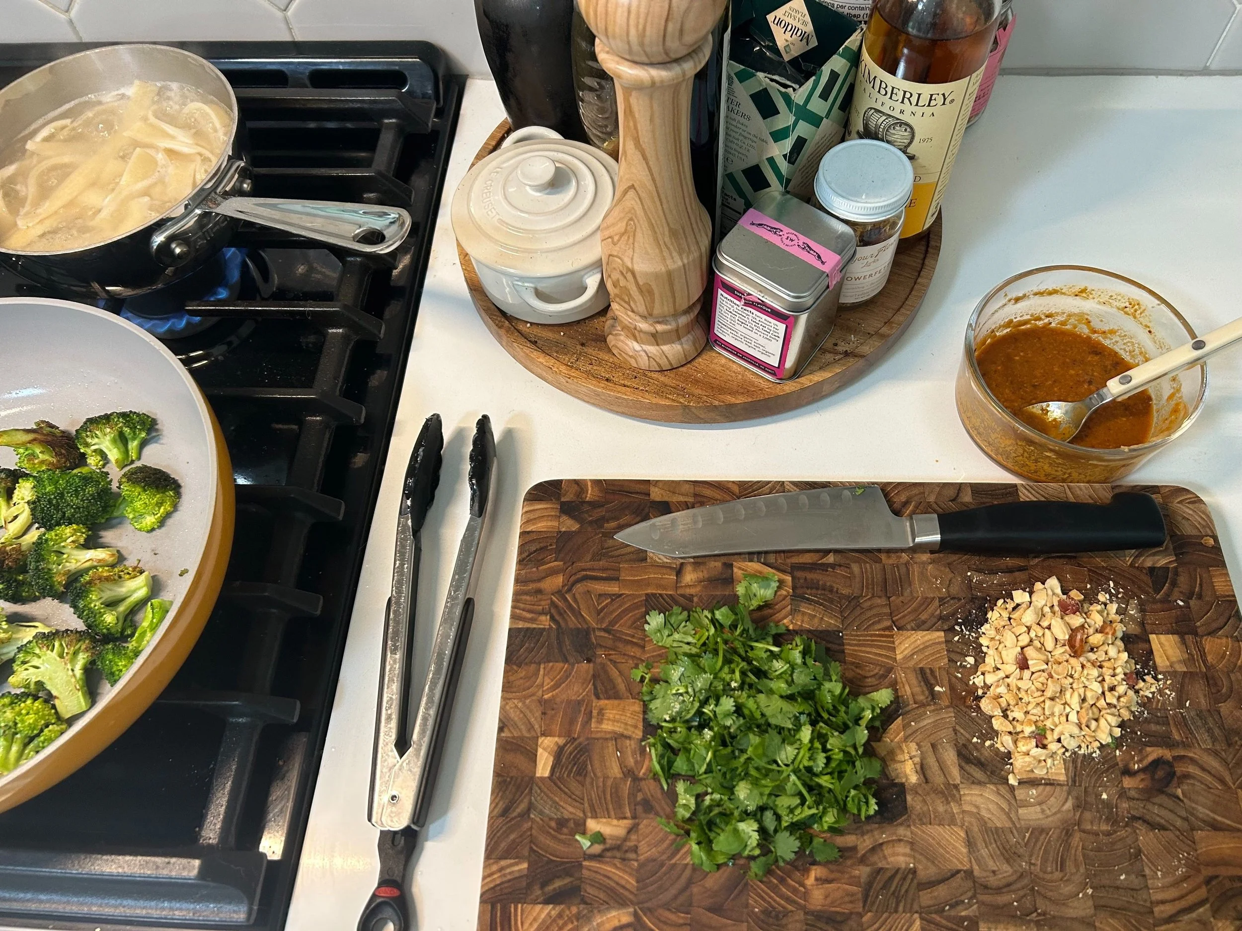 spicy peanut noodles being made