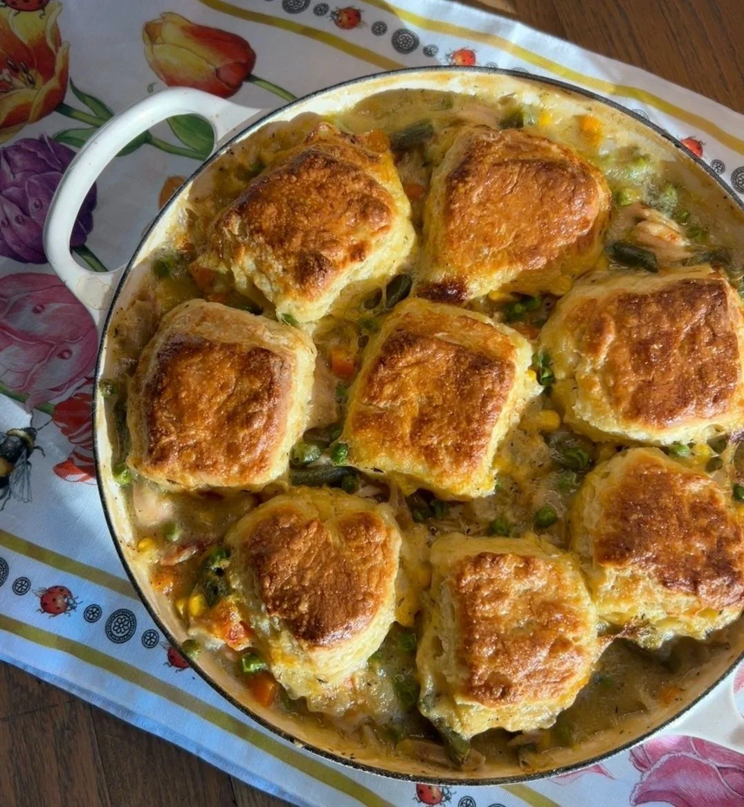 This delicious chicken pot pie casserole with biscuits dish served and ready to eat.