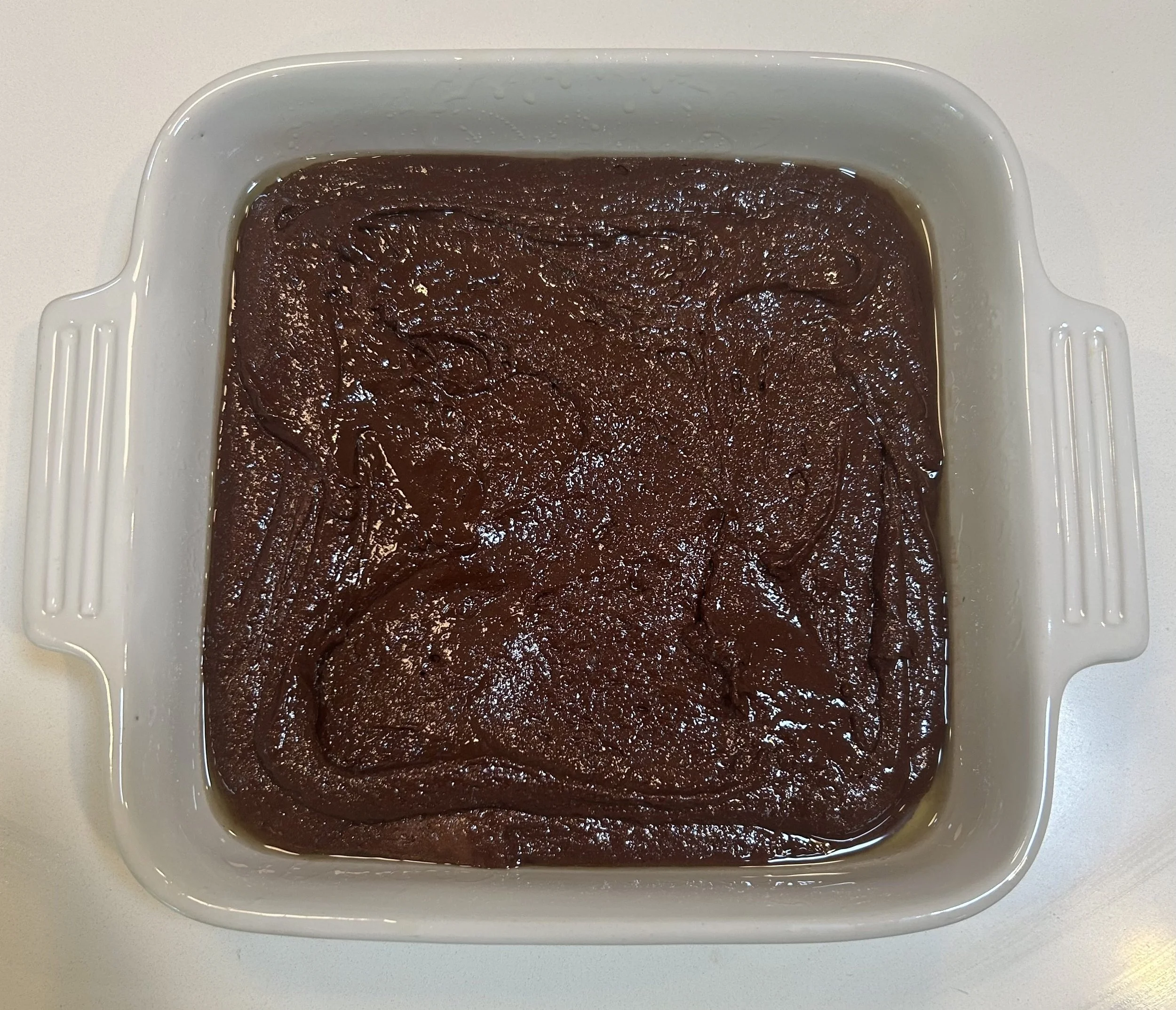 Brown butter brownie batter ready to bake in the oven