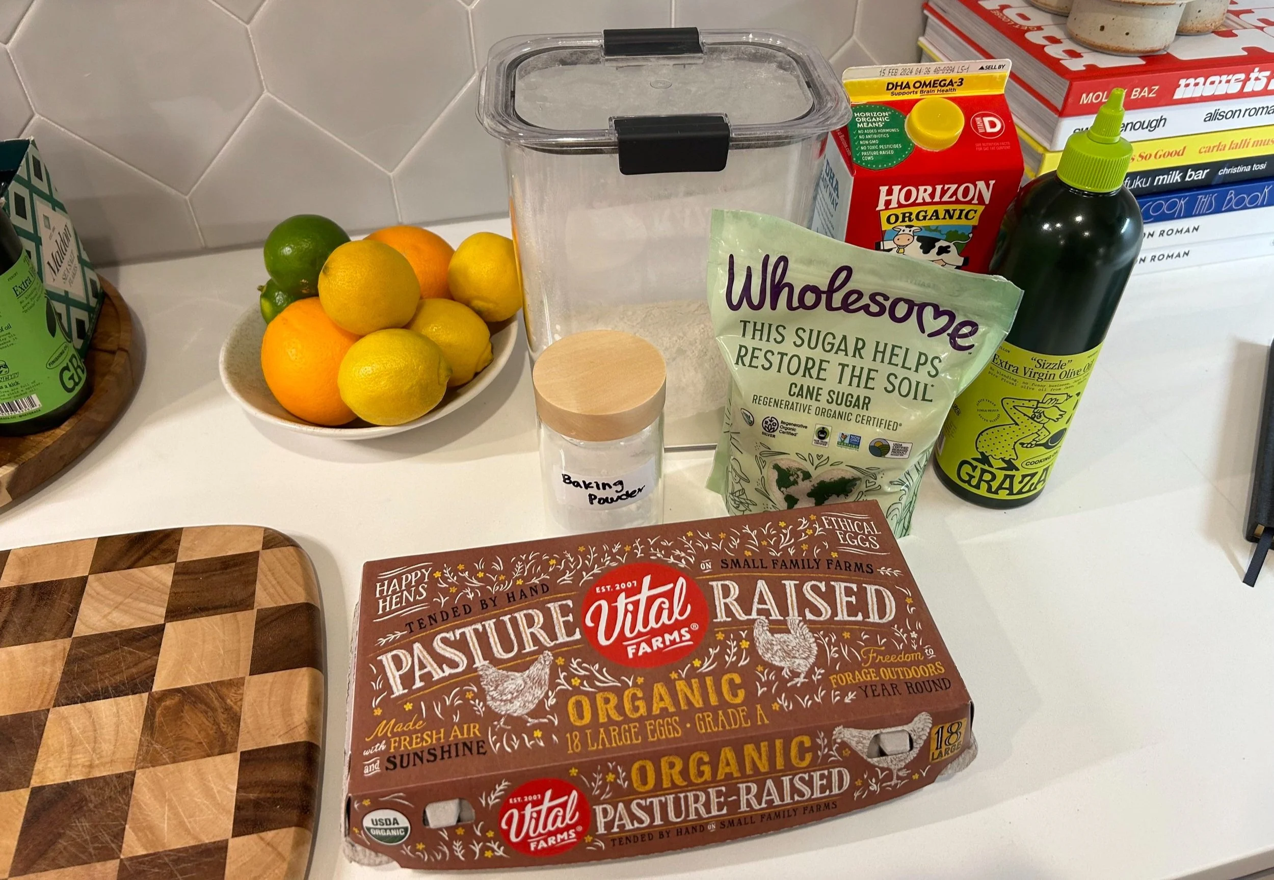 all of the ingredients necessary to make a citrus olive oil cake
