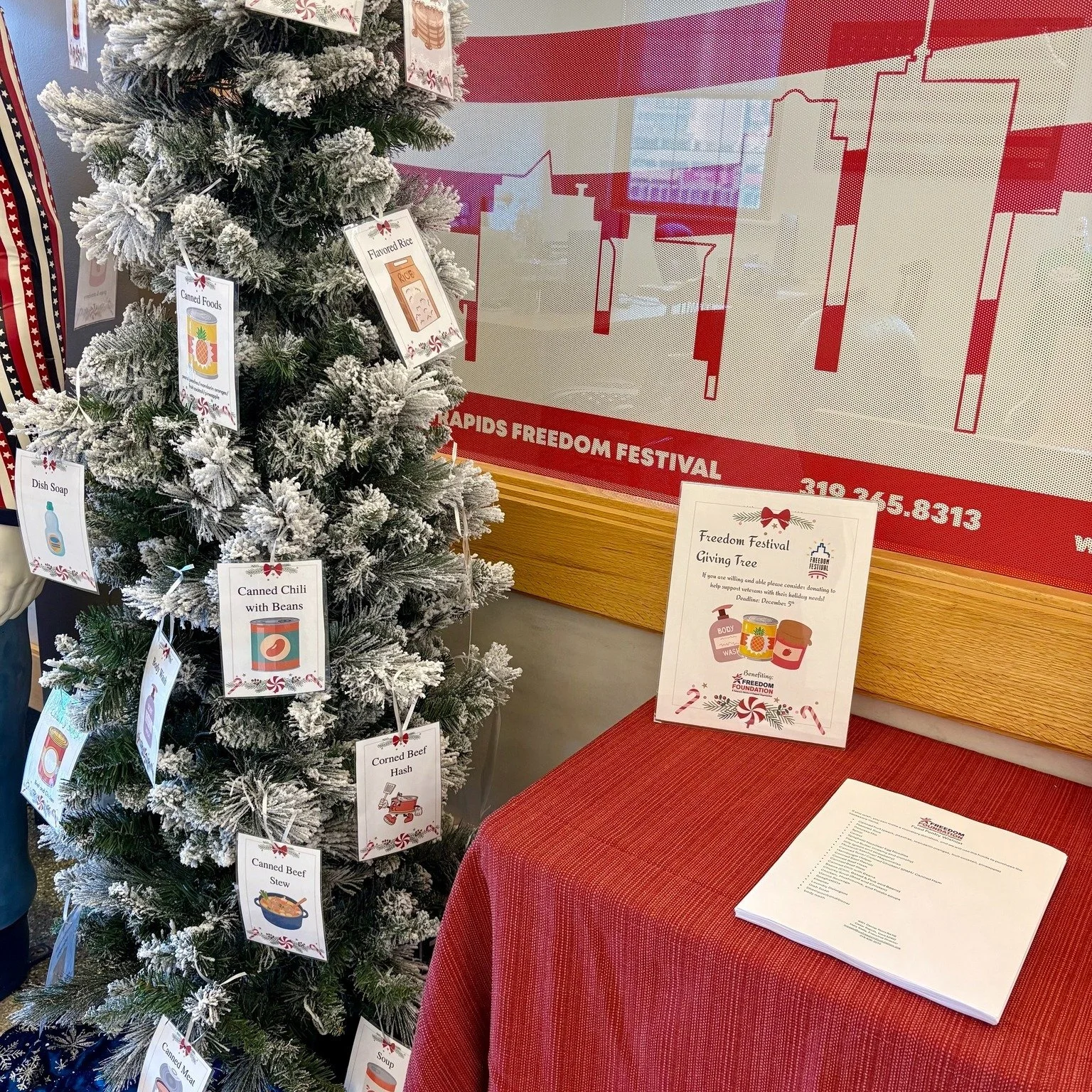 🎁The season of giving is here! 🌟 The Freedom Festival Giving Tree is back this year benefitting the Freedom Foundation as they work to build their pantry to better serve local veterans. ❤ Stop by our office located inside the Veterans Memorial Buil