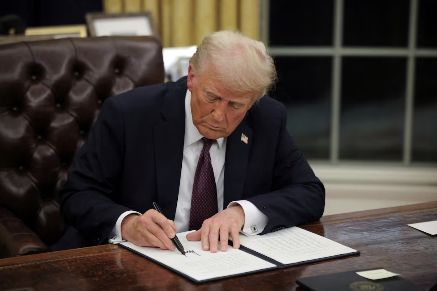 Transgender inmate sues over Trump's order curtailing LGBT rights