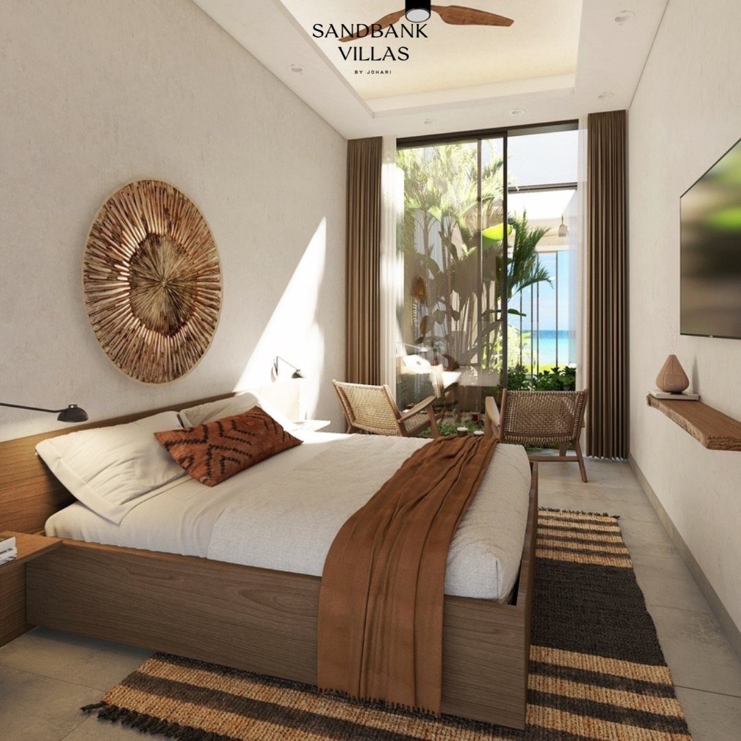 Sandbank Villas: Tranquility by Design 

Sandbank Villas' bedrooms are designed for ultimate relaxation. Calming neutral tones and quality materials create a sanctuary that reflects Zanzibar's natural beauty.

Floor-to-ceiling windows bathe the space