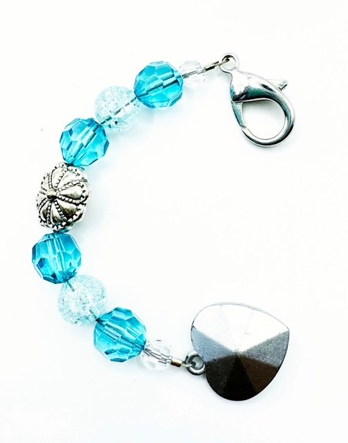 Light blue faceted bead silver sloral and heart pendant purse charm 2.jpeg