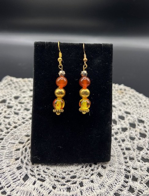 orange speckled dangle earring 2.jpeg