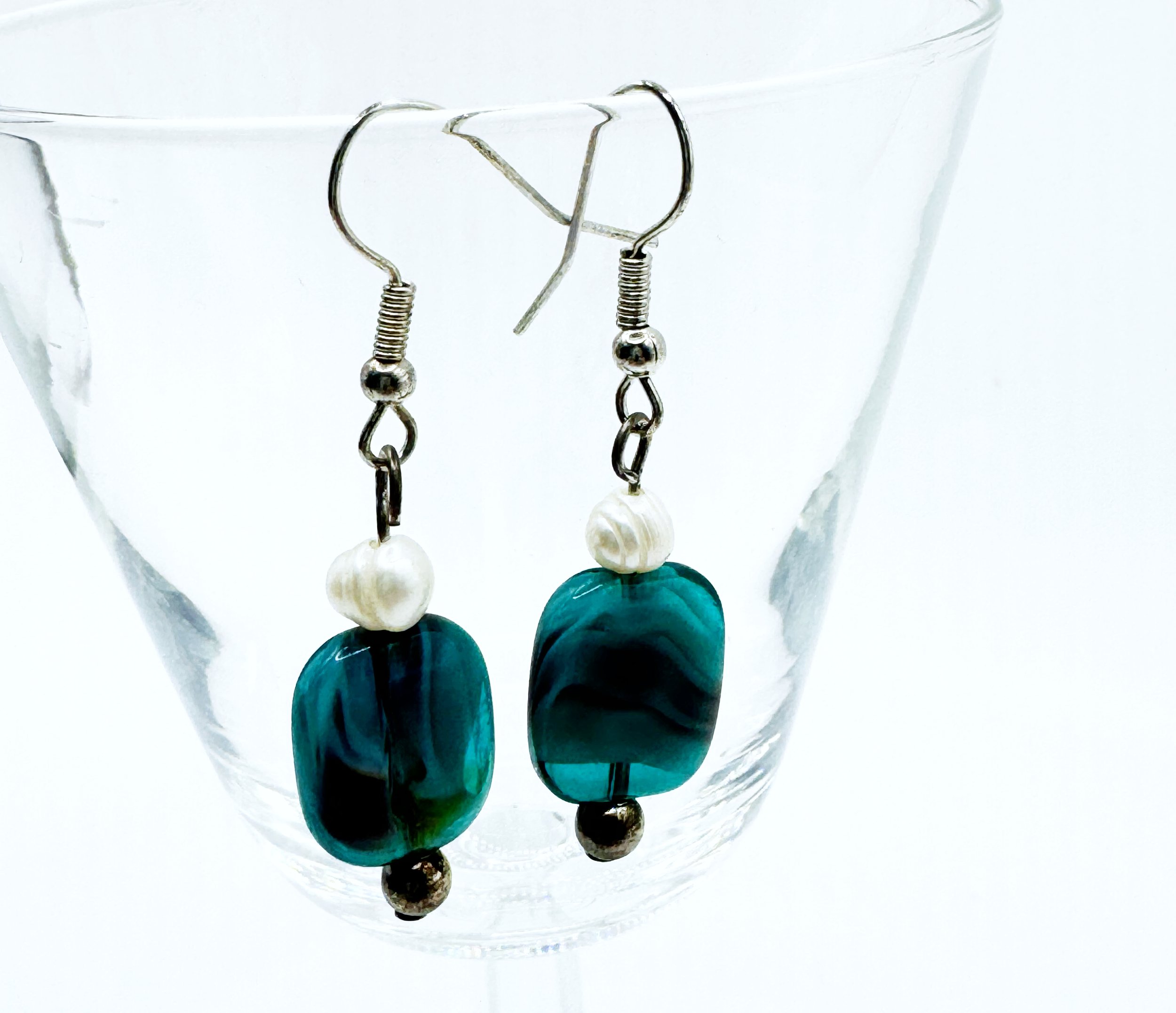 Cloudy blues with purple swirls and pearl and silver beads.jpg
