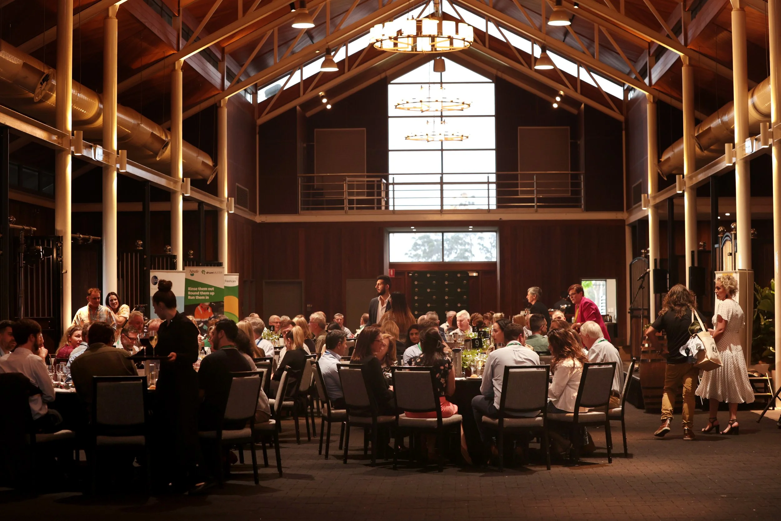Conference, panel, or workshop setting, audience engaged.