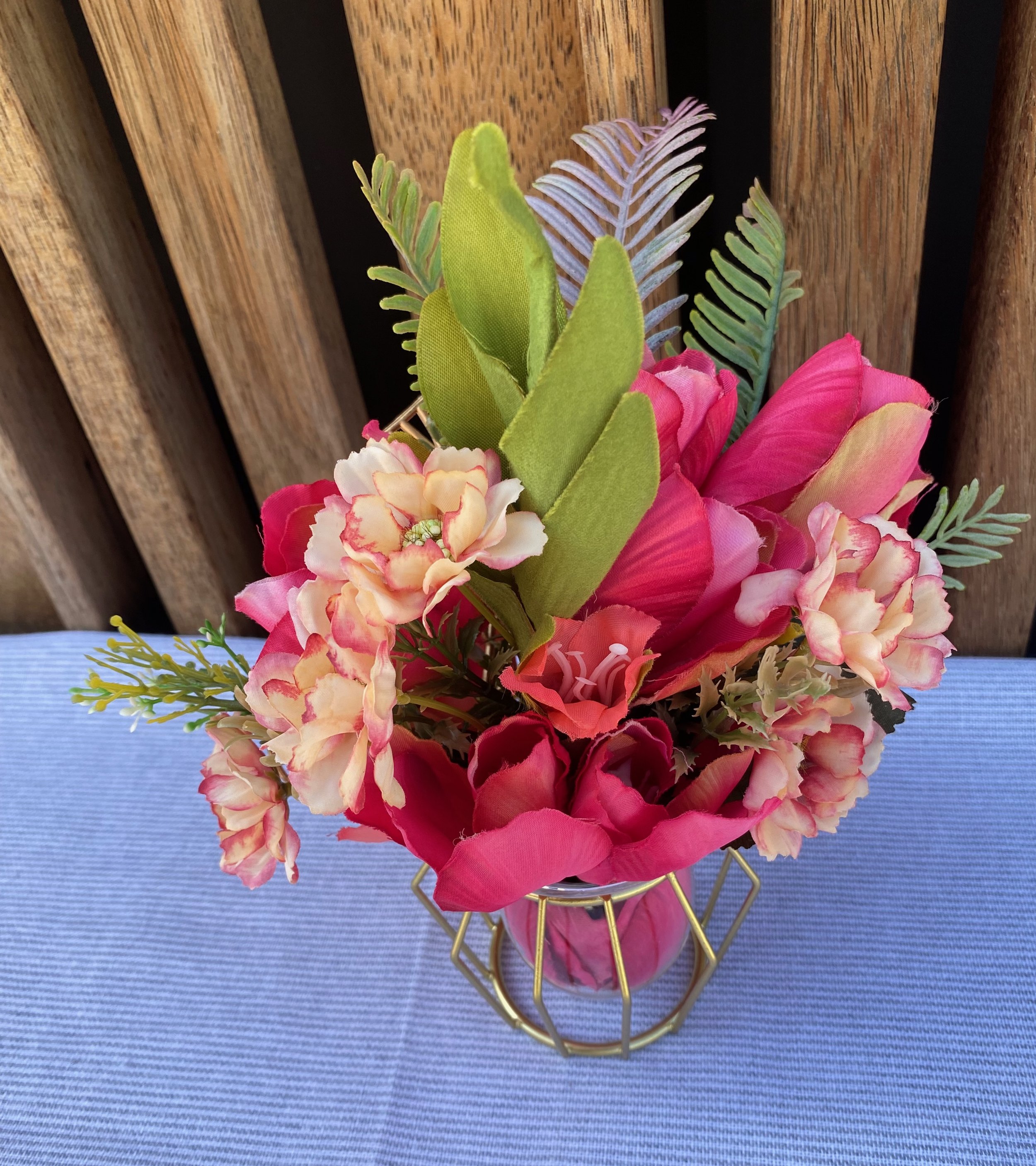 silk tulips in small vase