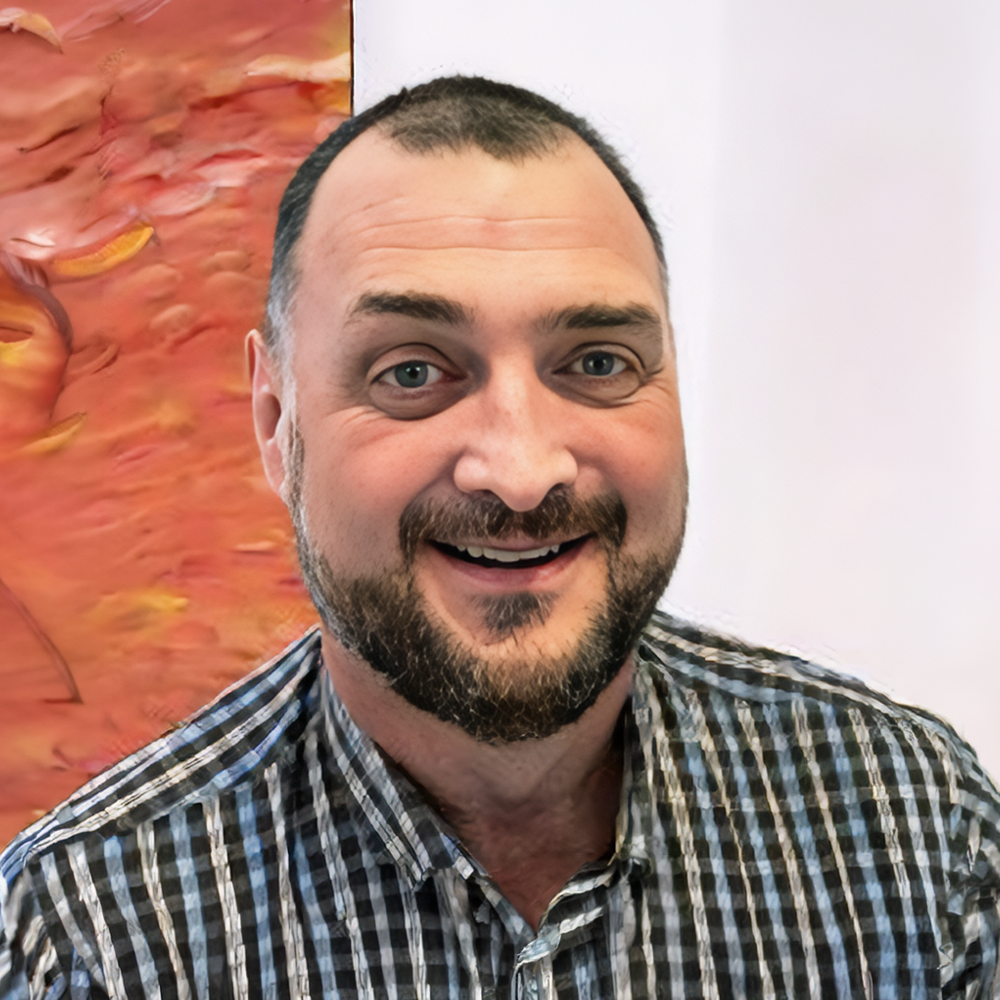 Headshot of John Leahy