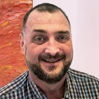 Headshot of John Leahy