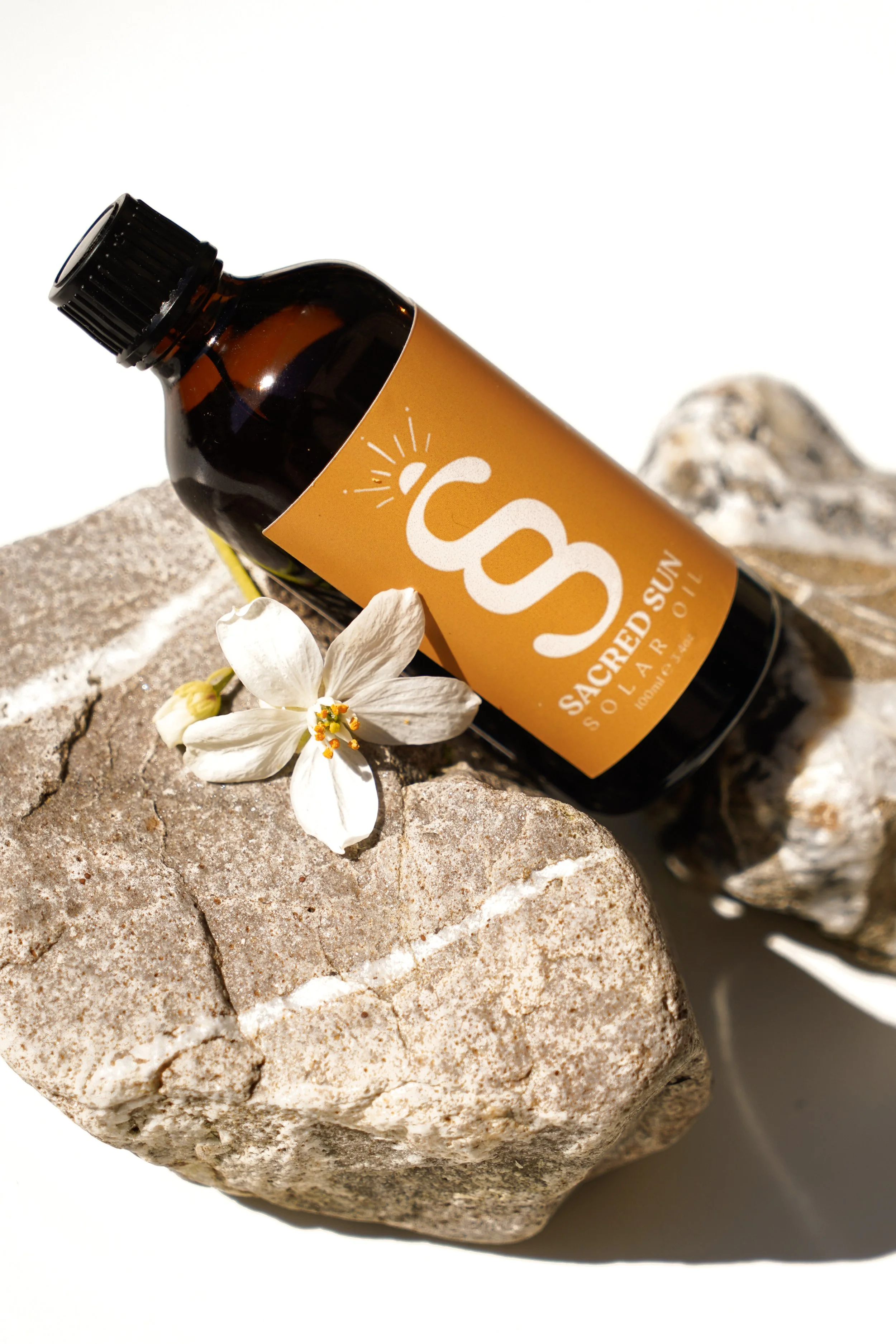 sacred sun on rocks whiter-1.jpg