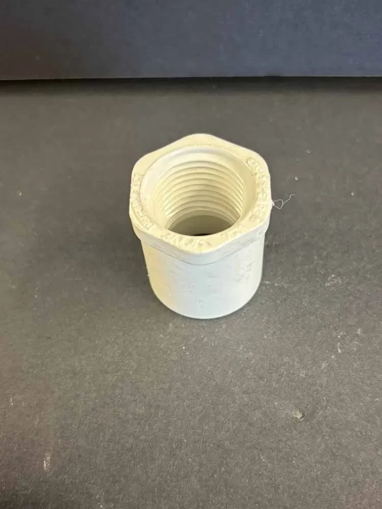 501048+-+PVC+Bushing+3_4_+Slip+x+1_2_+FPT.webp