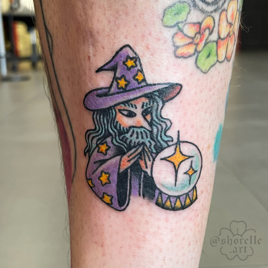 trad-wizard-pondering-orb-tattoo.png