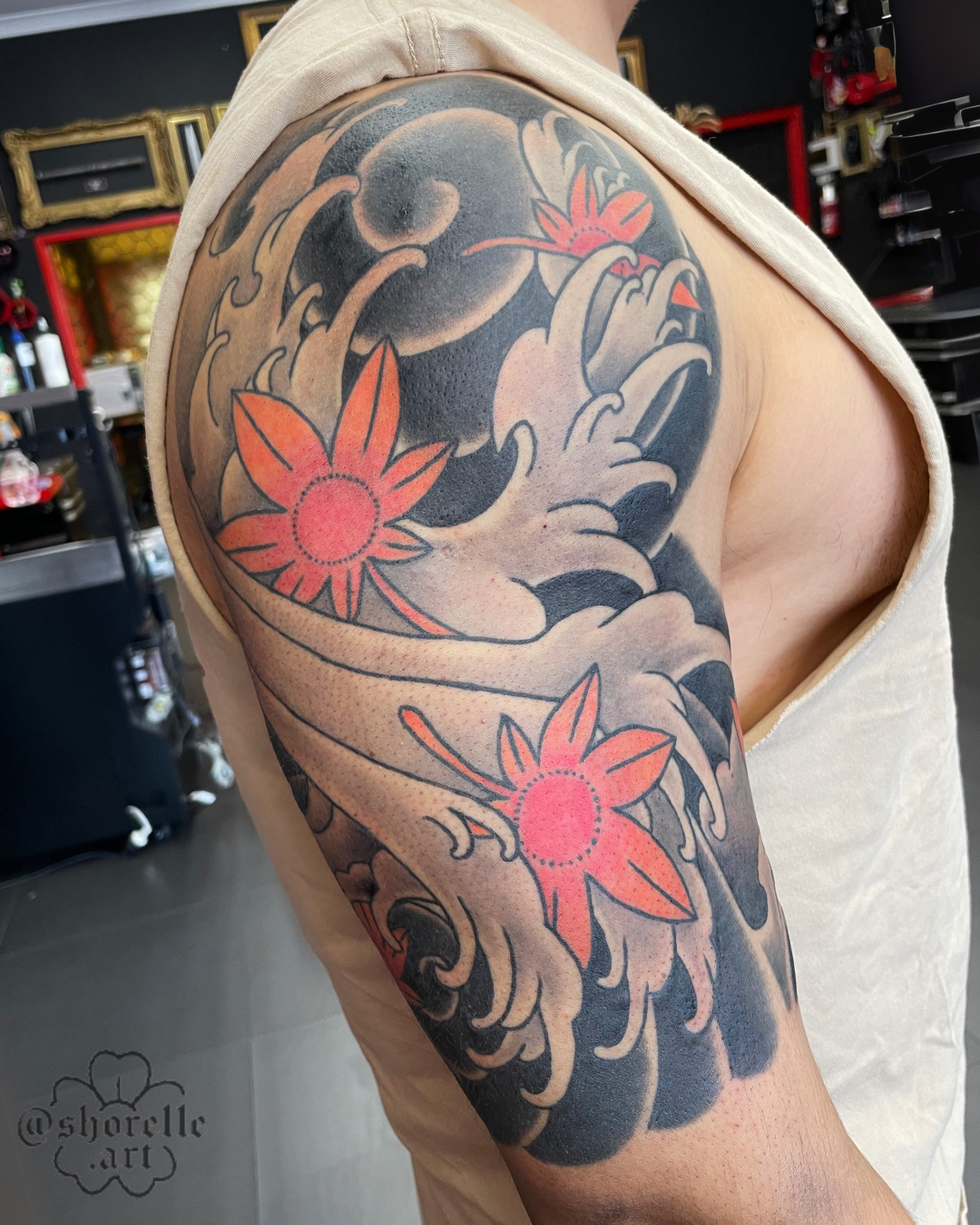 maple-leaves-waves-japanese-half-sleeve-tattoo.png